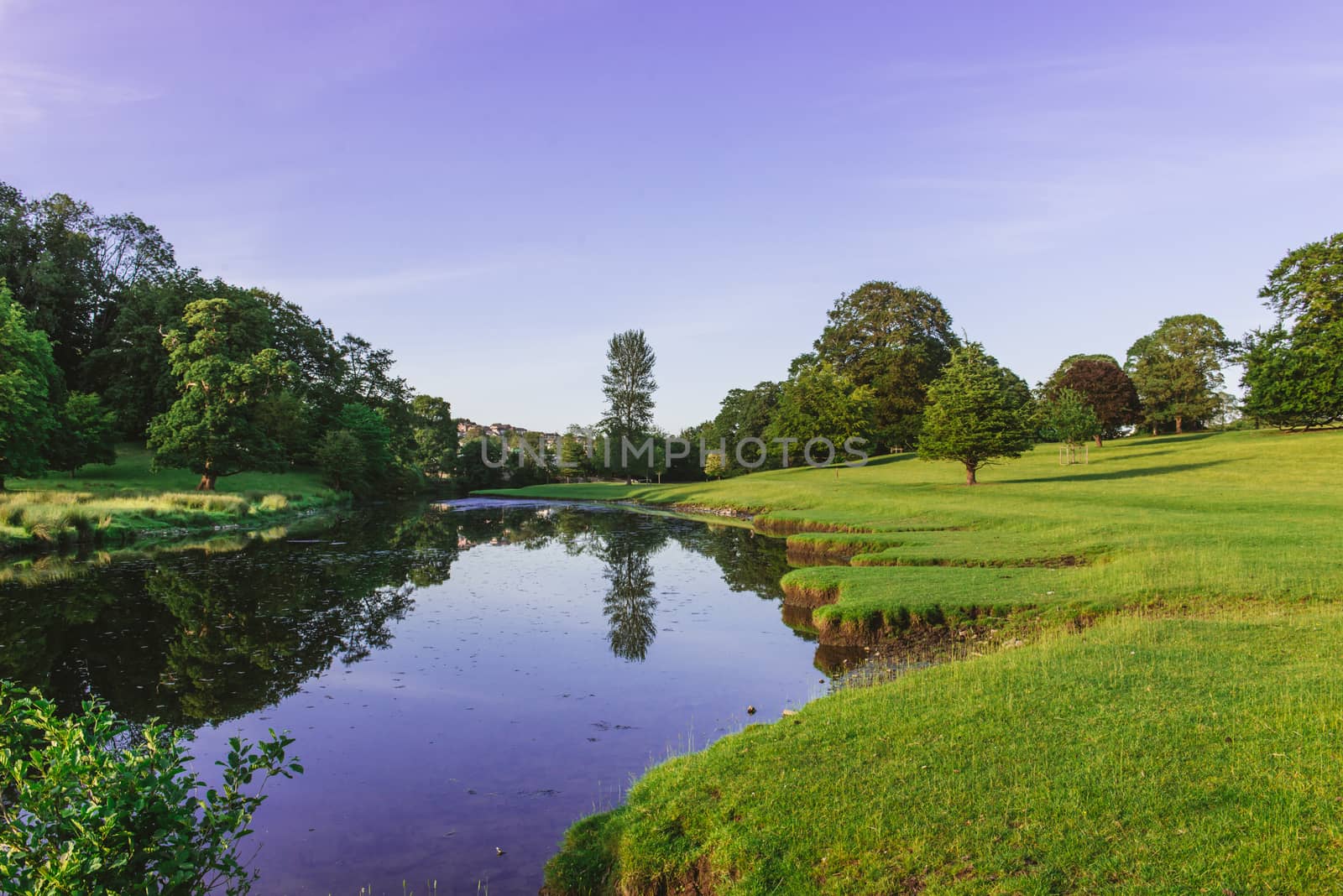 a bend in the River Bela at Dallam Park, Milnthorpe, Cumbria, England by paddythegolfer