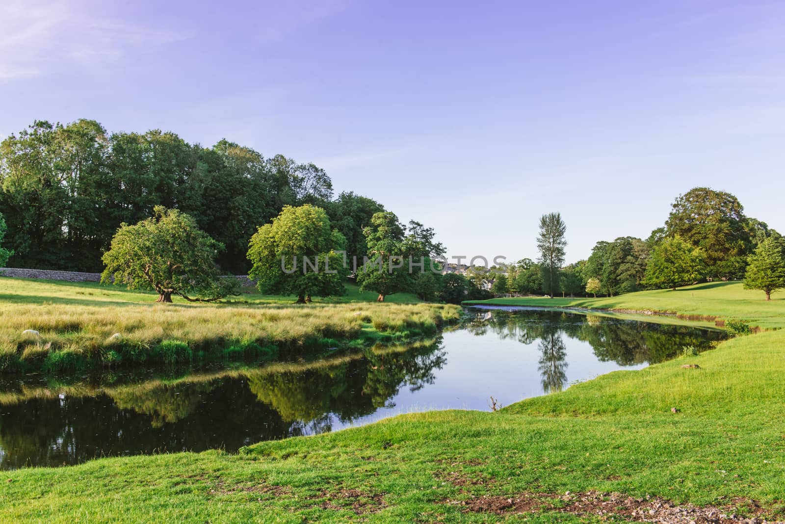 a bend in the River Bela at Dallam Park, Milnthorpe, Cumbria, UK