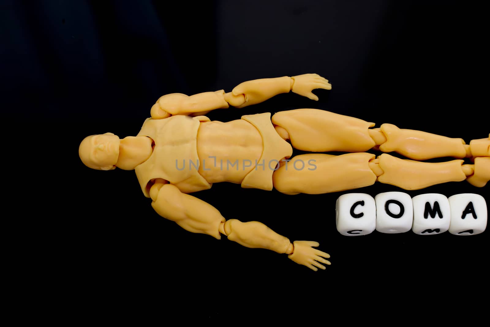 coma, a condition that needs urgent medical treatment is depicted as a model man lying on the floor