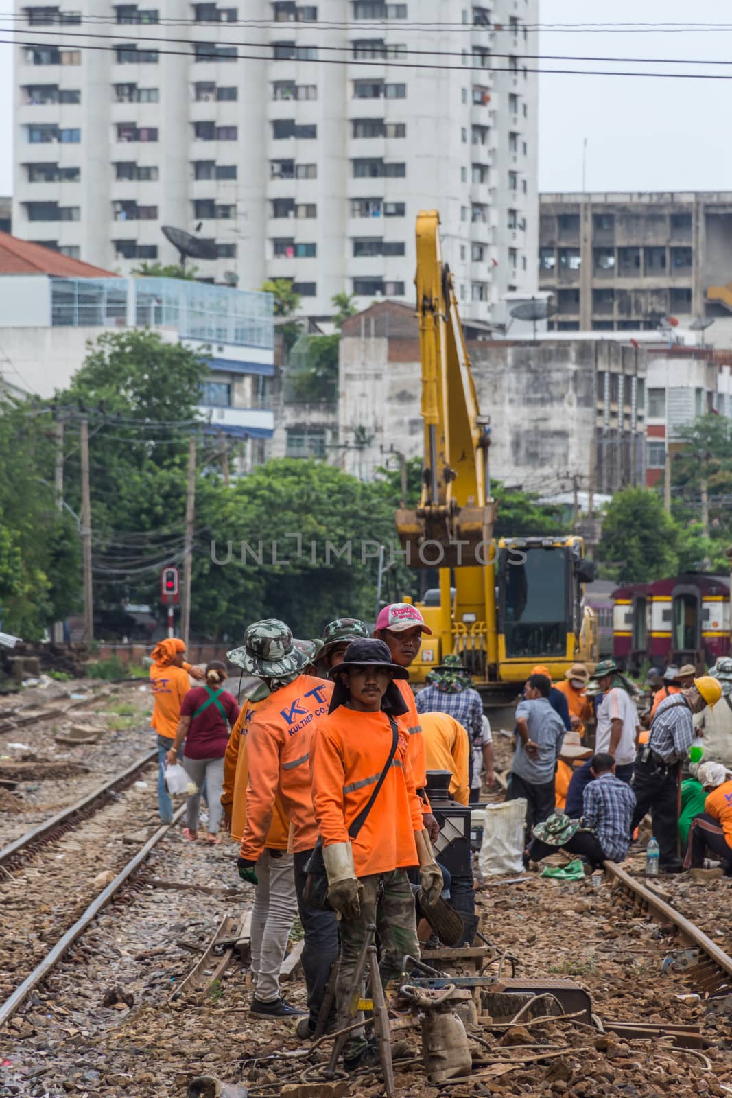 Bangkok, Thailand - August 11, 2016 : Unidentified railway employees working for restoration the railroad tracks in Bangkok station before serving at State Railway of Thailand.