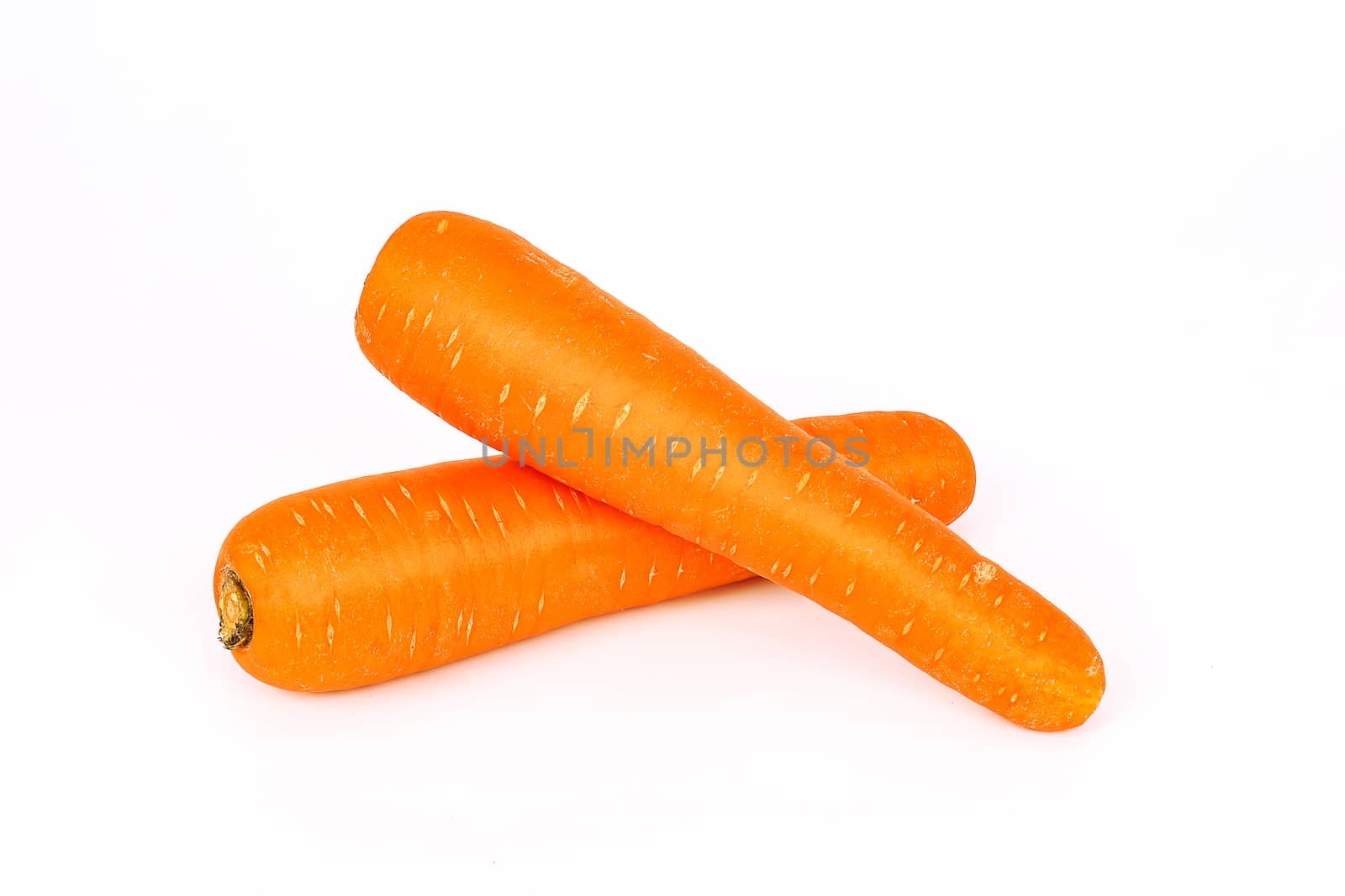 top view of fresh organic carrot isolated on white background