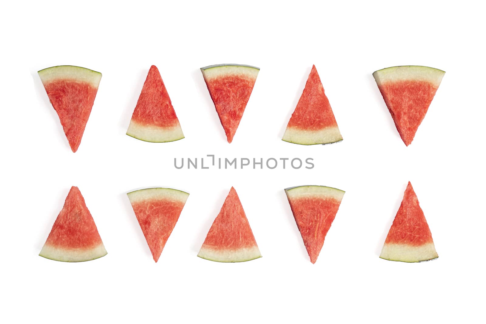 Watermelon slices on white background. Summer fruit concept. Top view, flat lay.