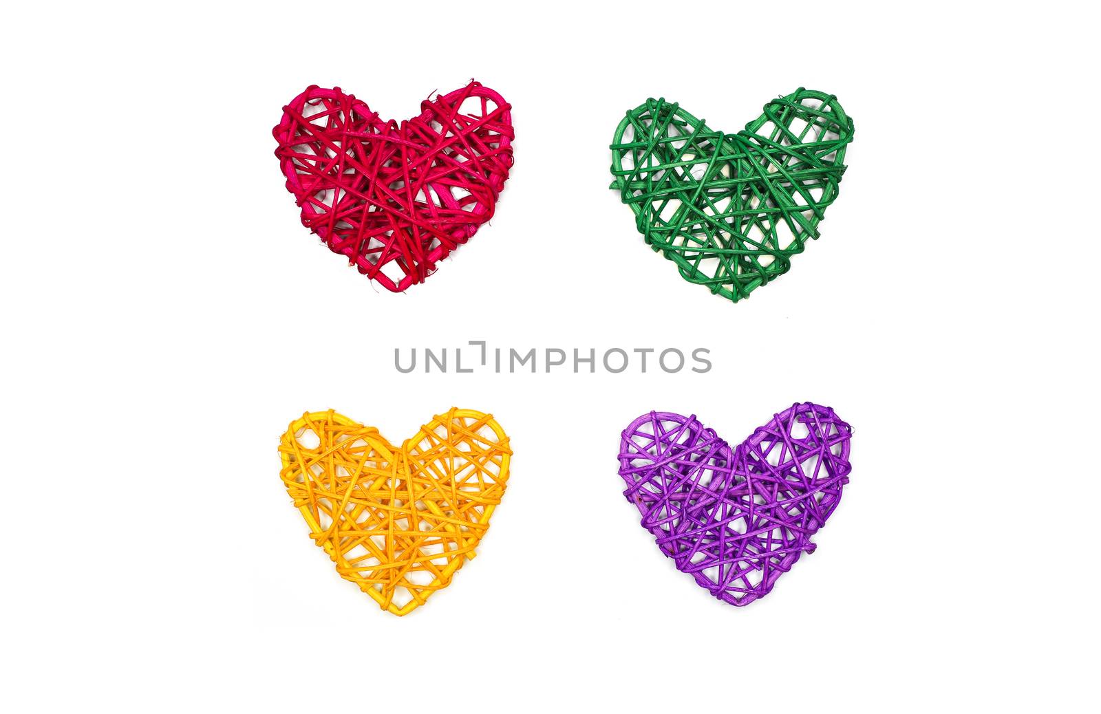 Multicolor hearts made of natural rattan arranged in squire pattern. Love, romance concept.
