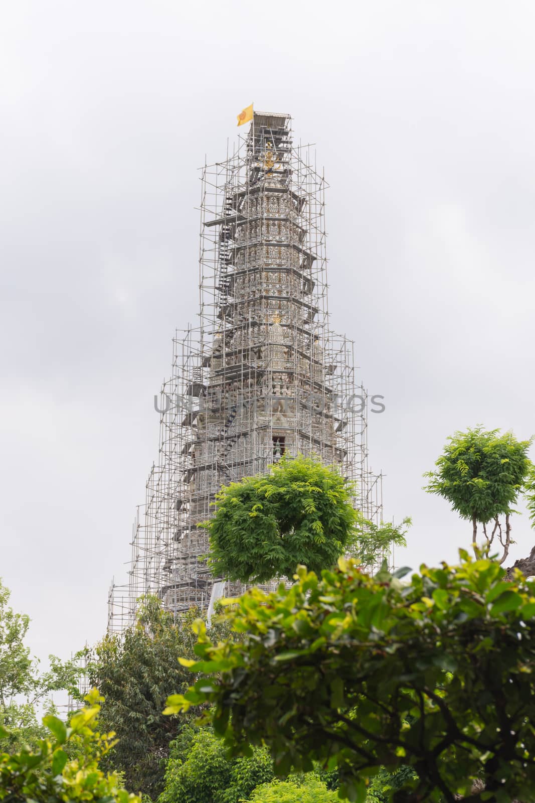 Thai pagoda repairing in temple (Wat Arun Ratchawararam) by PongMoji