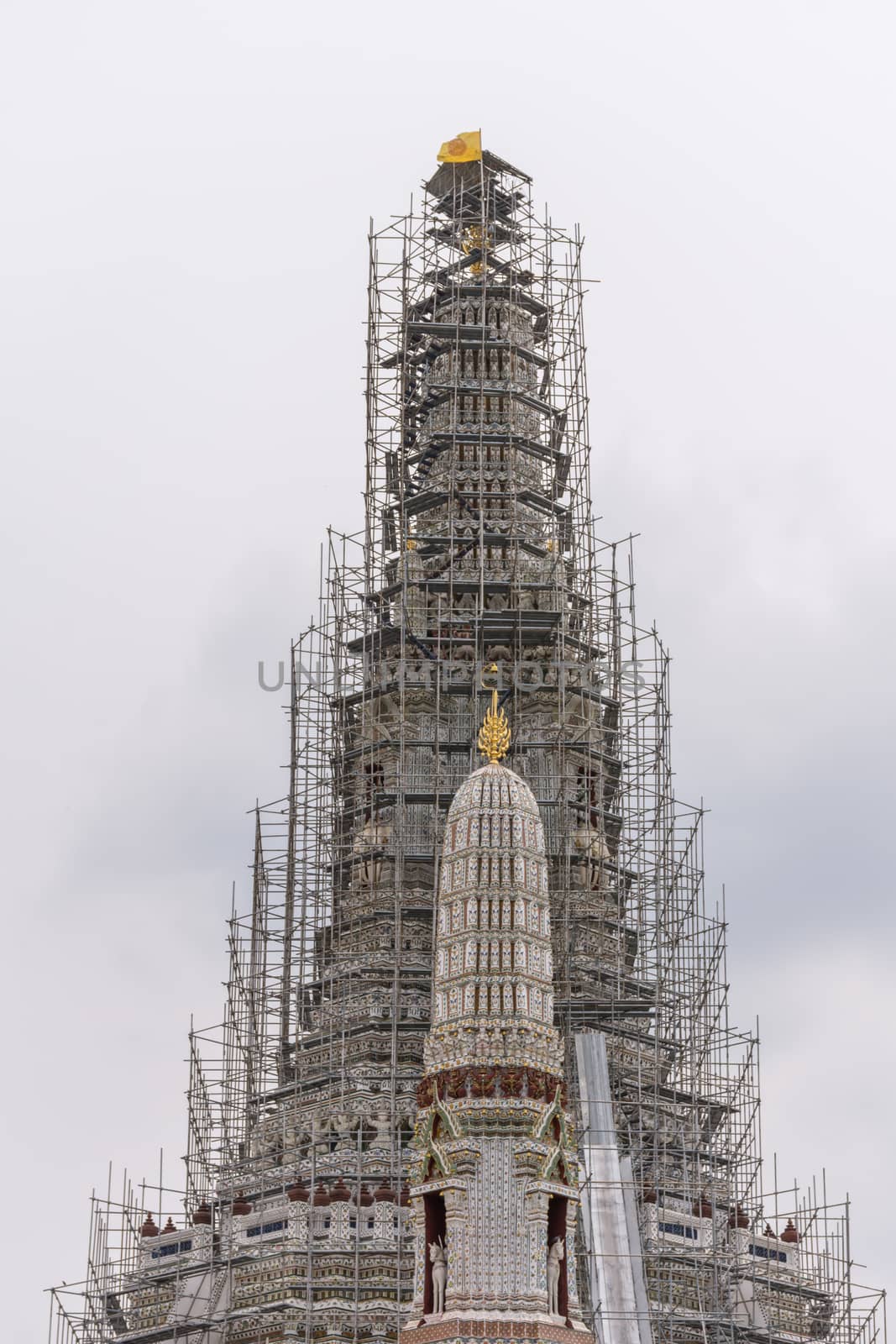 Thai pagoda repairing in temple (Wat Arun Ratchawararam) by PongMoji