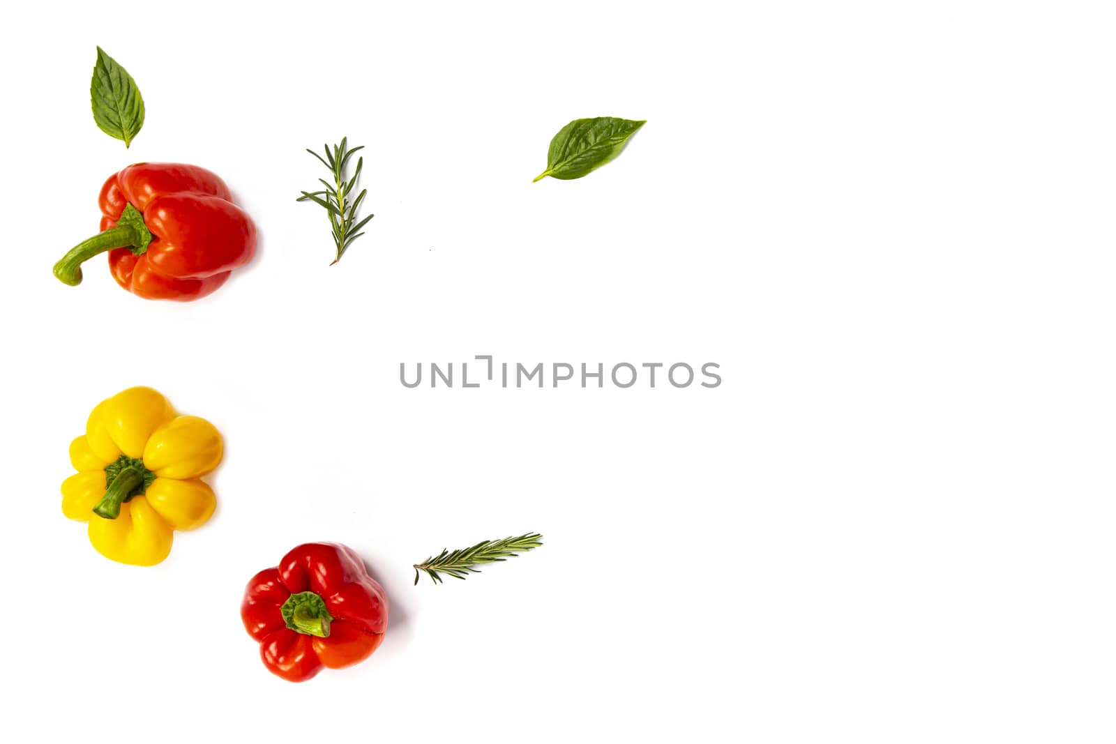 bell peppers with rosemary sprigs and basil leaves, top view by Nawoot