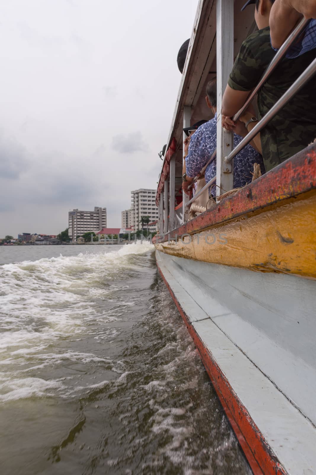 Bangkok, Thailand - August 28, 2016 : Boat driver service for Tourist the popular boat travel on the Chao Phraya river. To stay in downtown Bangkok. And tourist attractions on both sides of the river.