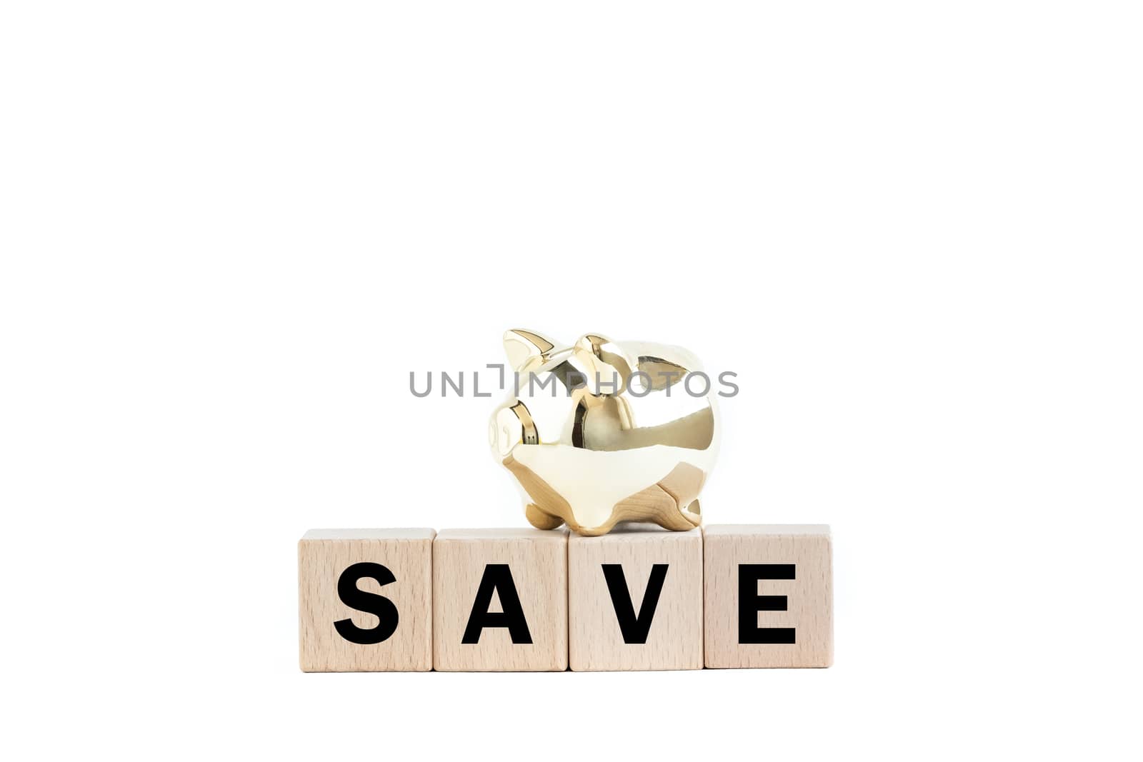 gold piggy bank and wooden blocks with text. Isolated on white background. Saving concept.