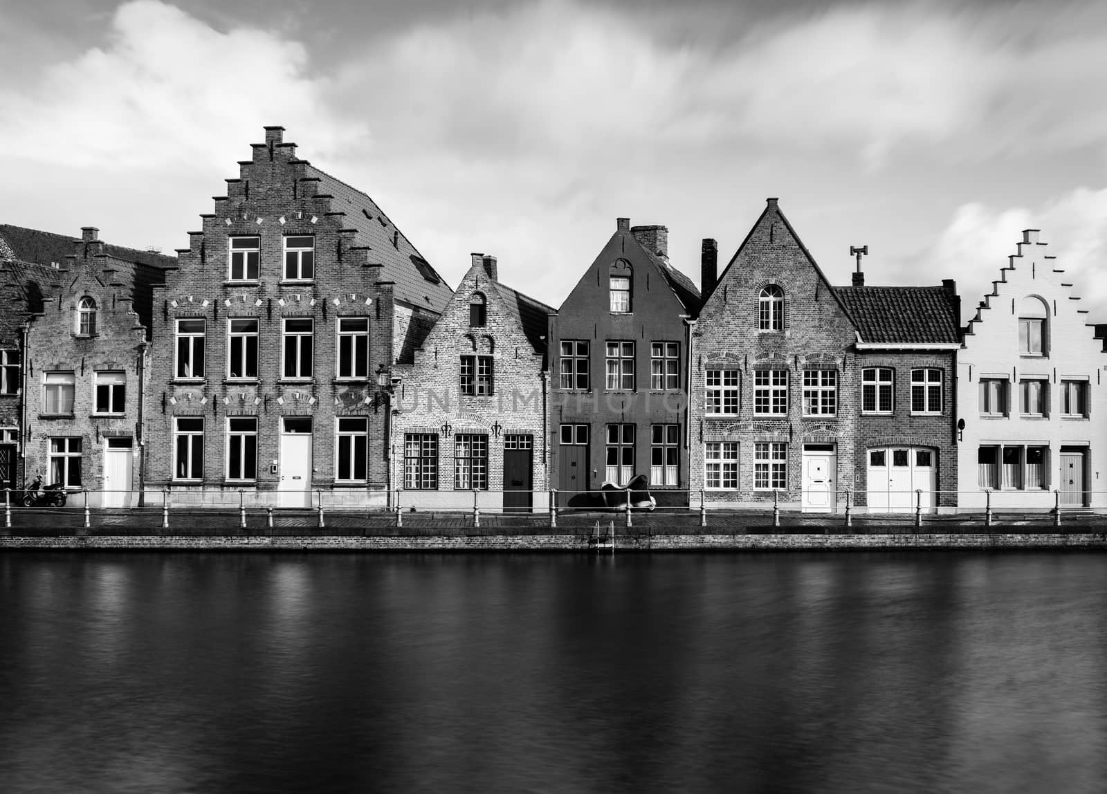 Old houses in Bruges (Brugge), Belgium. Black and white, long exposure photography