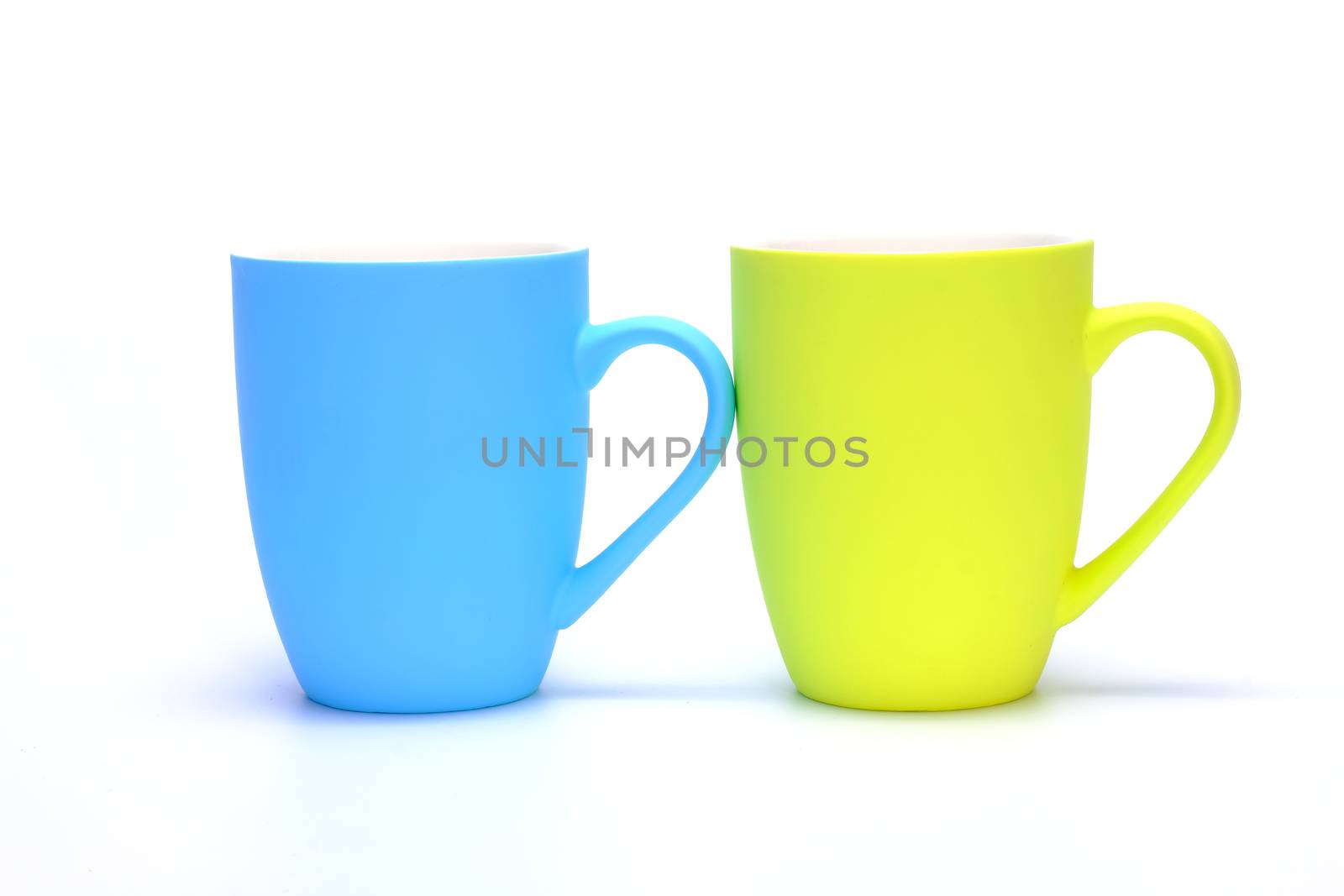 colorful coffee mugs isoloated on whire bavk
