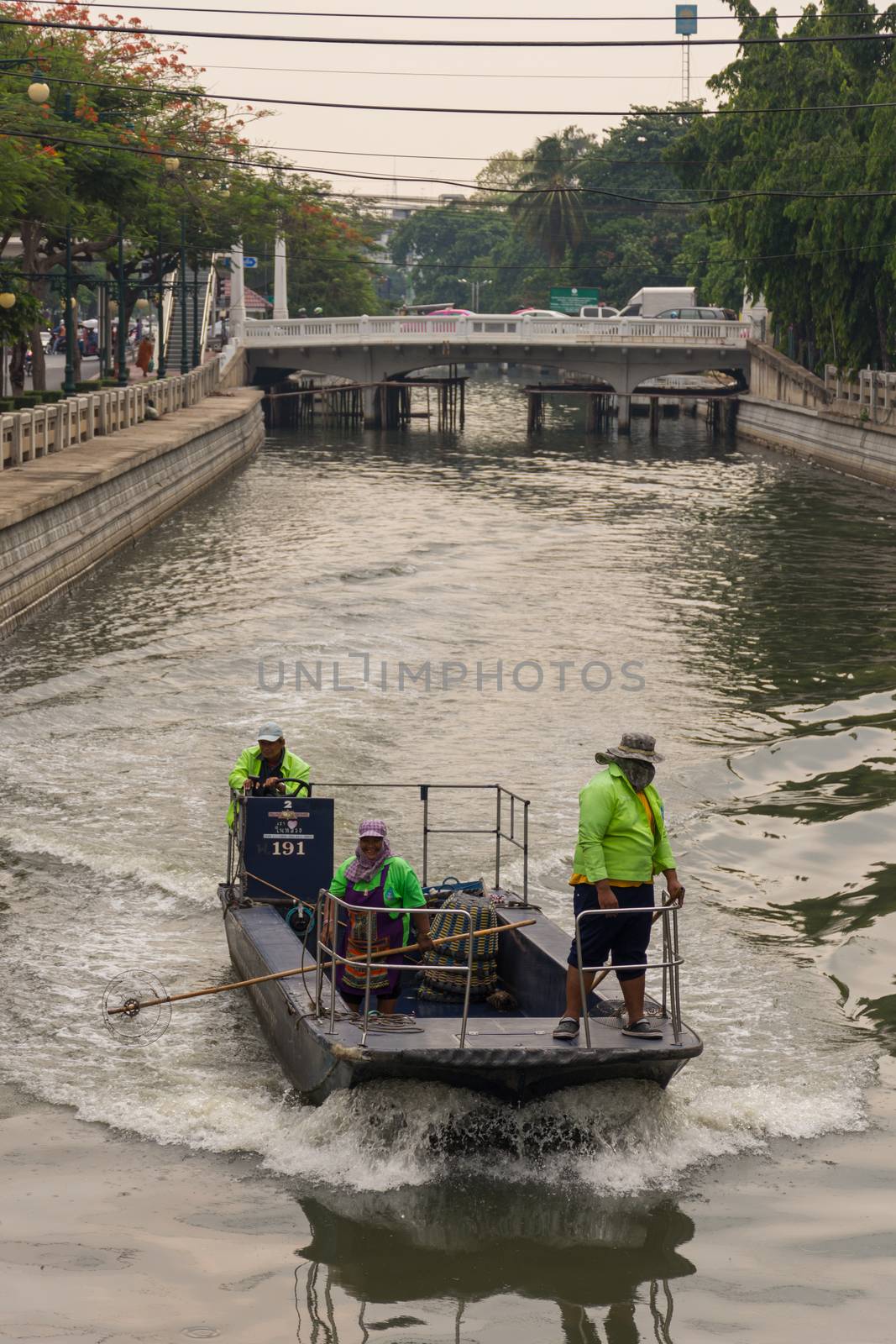 Bangkok, Thailand - May 16, 2016 : Garbage collection boat working in Khlong Phadung Krungkasem is a important canal in downtown Bangkok, Thailand.
