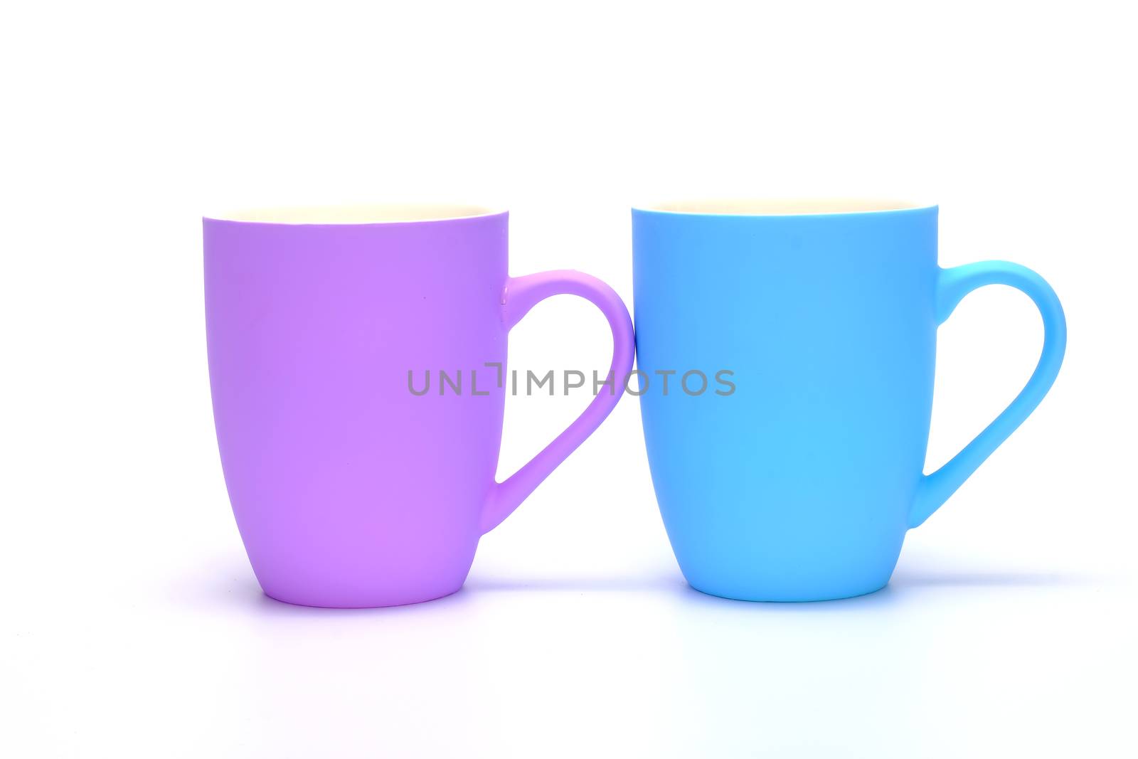 colorful coffee mugs on white background