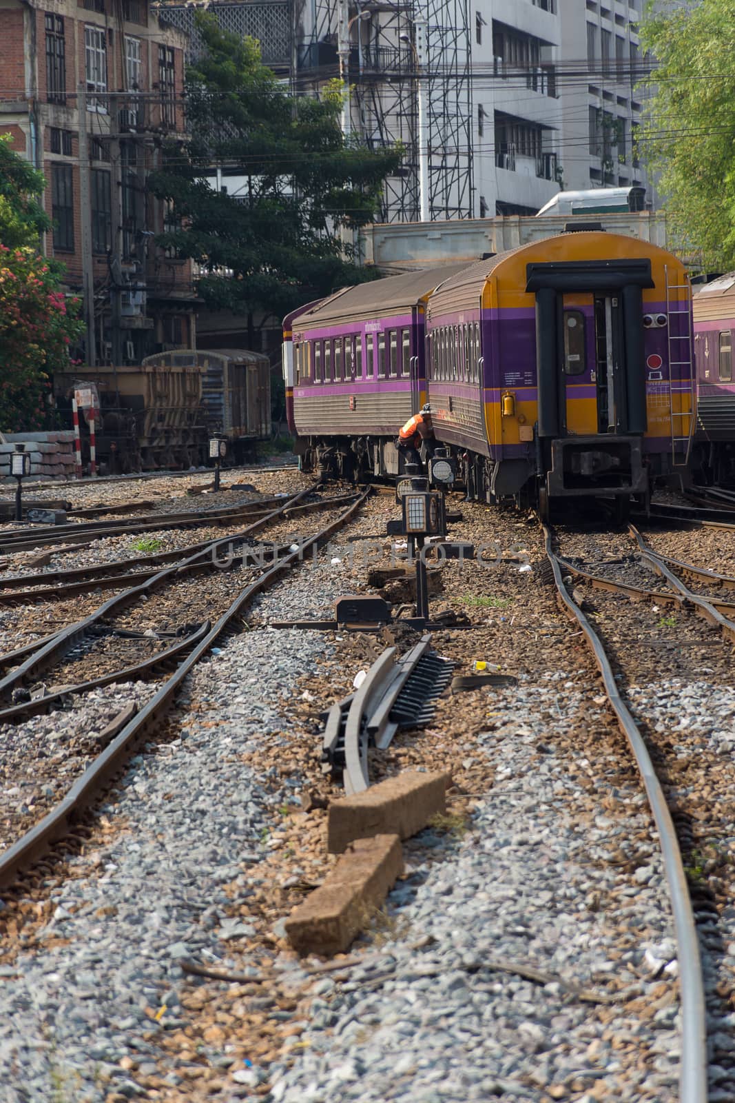Bangkok, Thailand - May 19, 2016 : Unidentified railway train on the railroad tracks in Bangkok station. Many people in Thailand popular travel by train because it is cheaper.