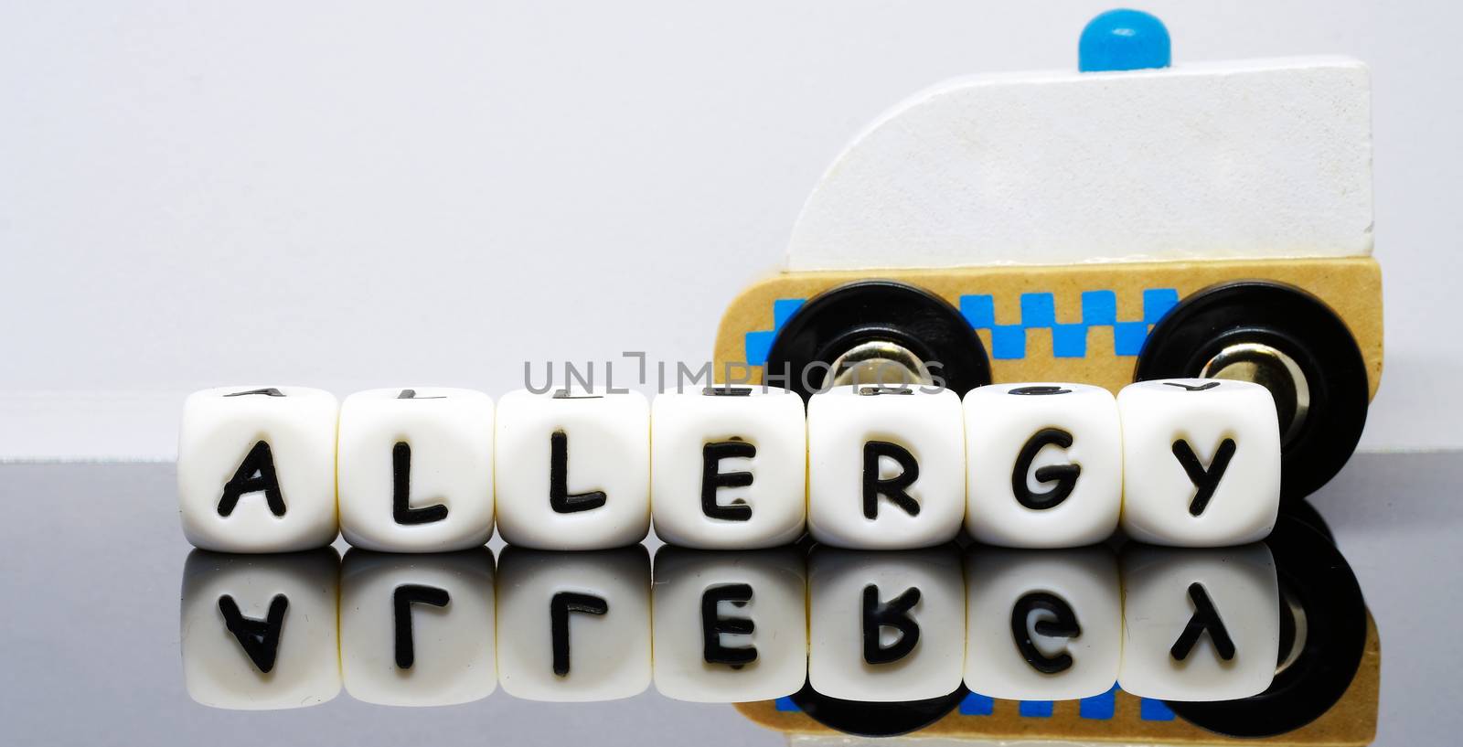 alphabet letters spelling a word 'Allergy', a condition demands urgent medical evaluation and treatment