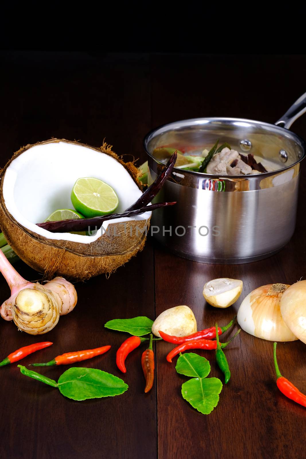 ingredients for preparing famous Thai Chicken Coconut Soup
(Tom Kha Gai) ' include coconut milk, shallot, galangal, lemon grass, red chilies, kaffir lime leaves, boneless chicken breast, lime juice