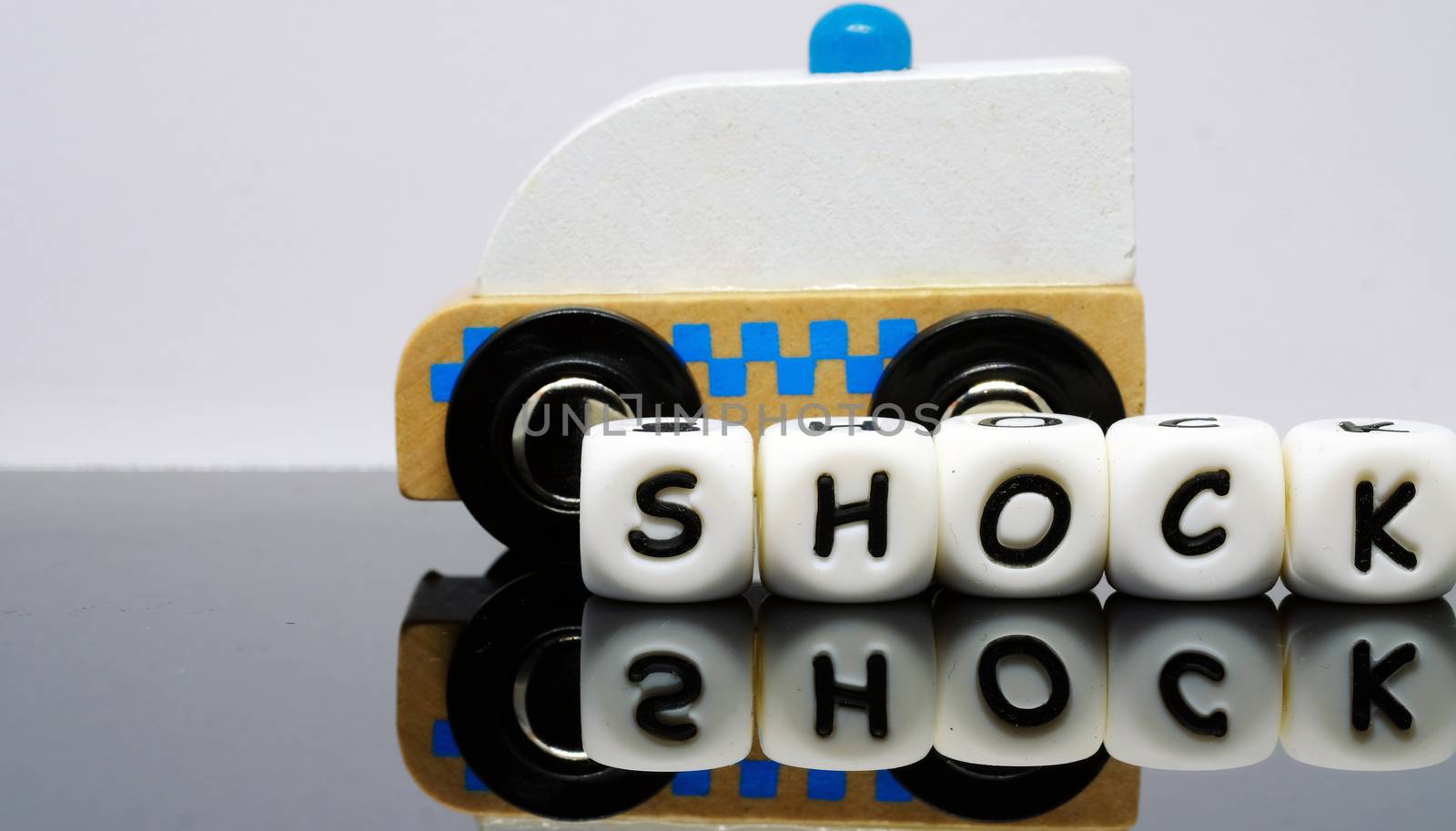 Alphabet Letters spelling a word shock by Nawoot