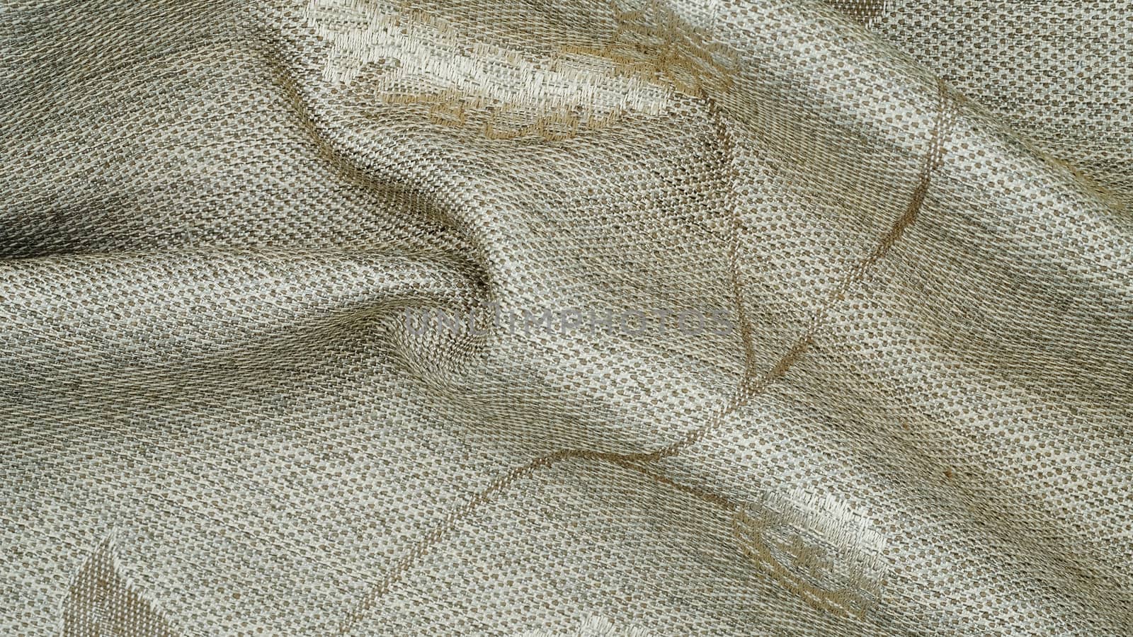 a closeup photo of a ruffled and beautiful piece of light color fabric with unrecognizable pattern, intened to be used by third party for background work