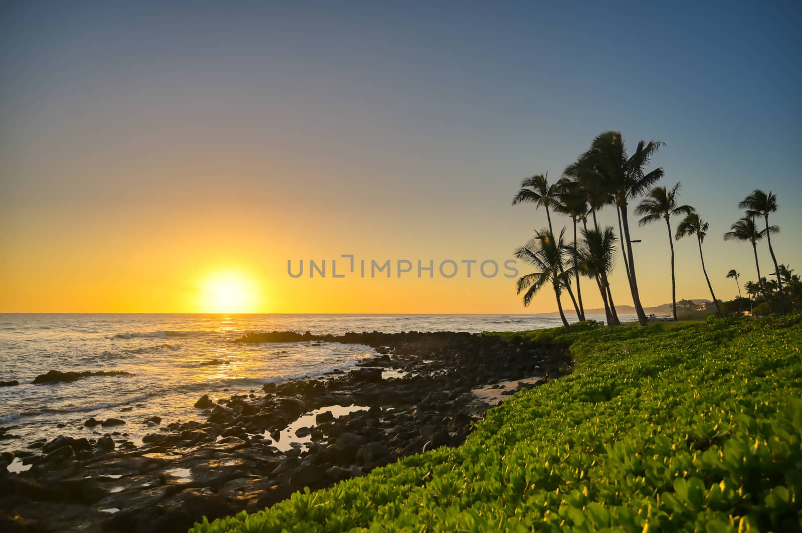 Sunset over the coast of Kauai, Hawaii.