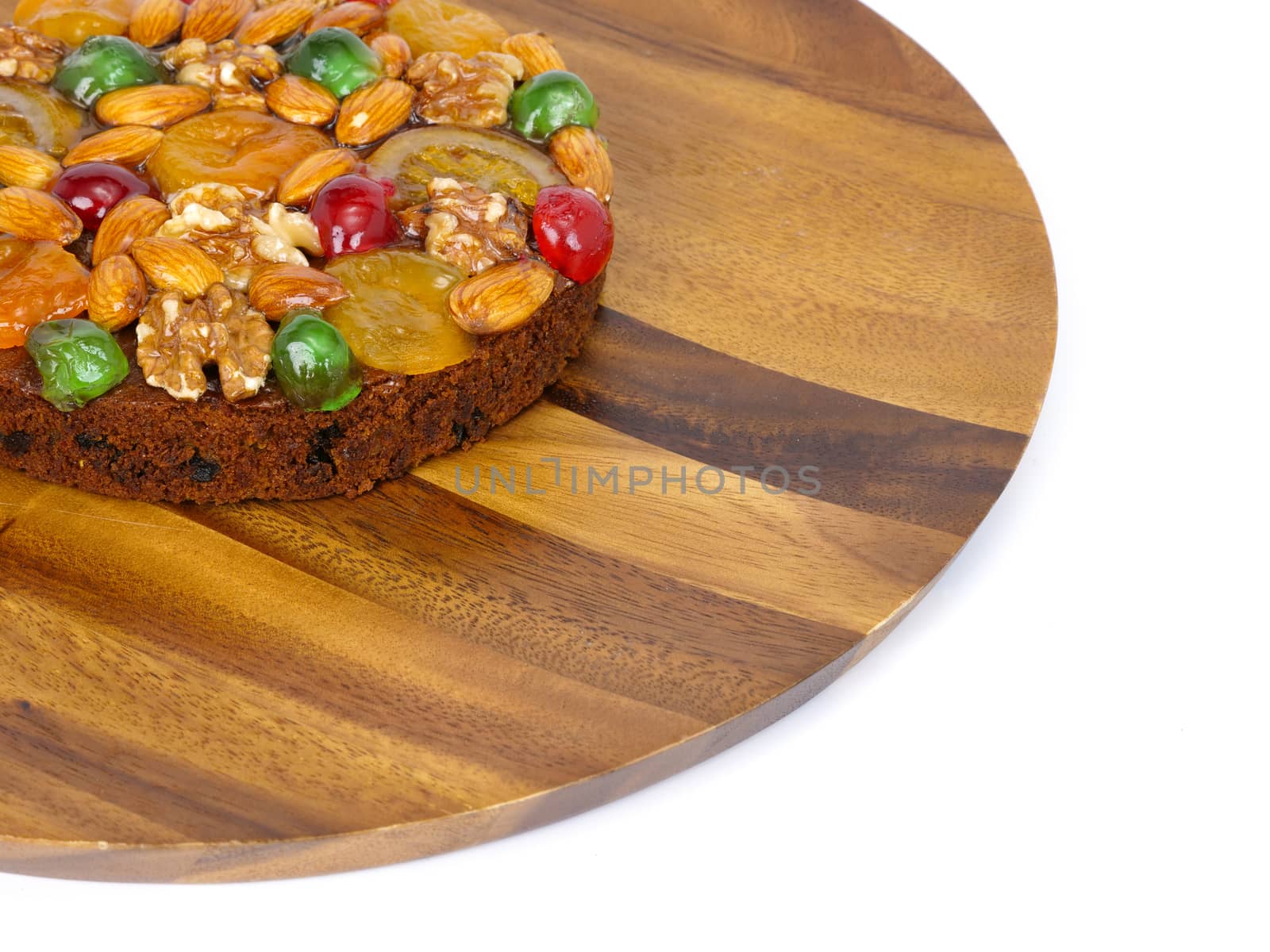 traditional fruitcake with fruits and nuts by Nawoot