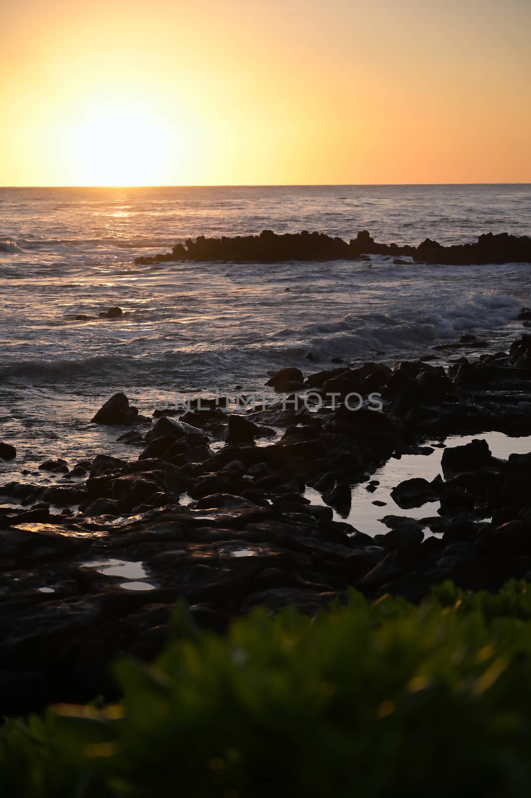 Sunset over the coast of Kauai, Hawaii.