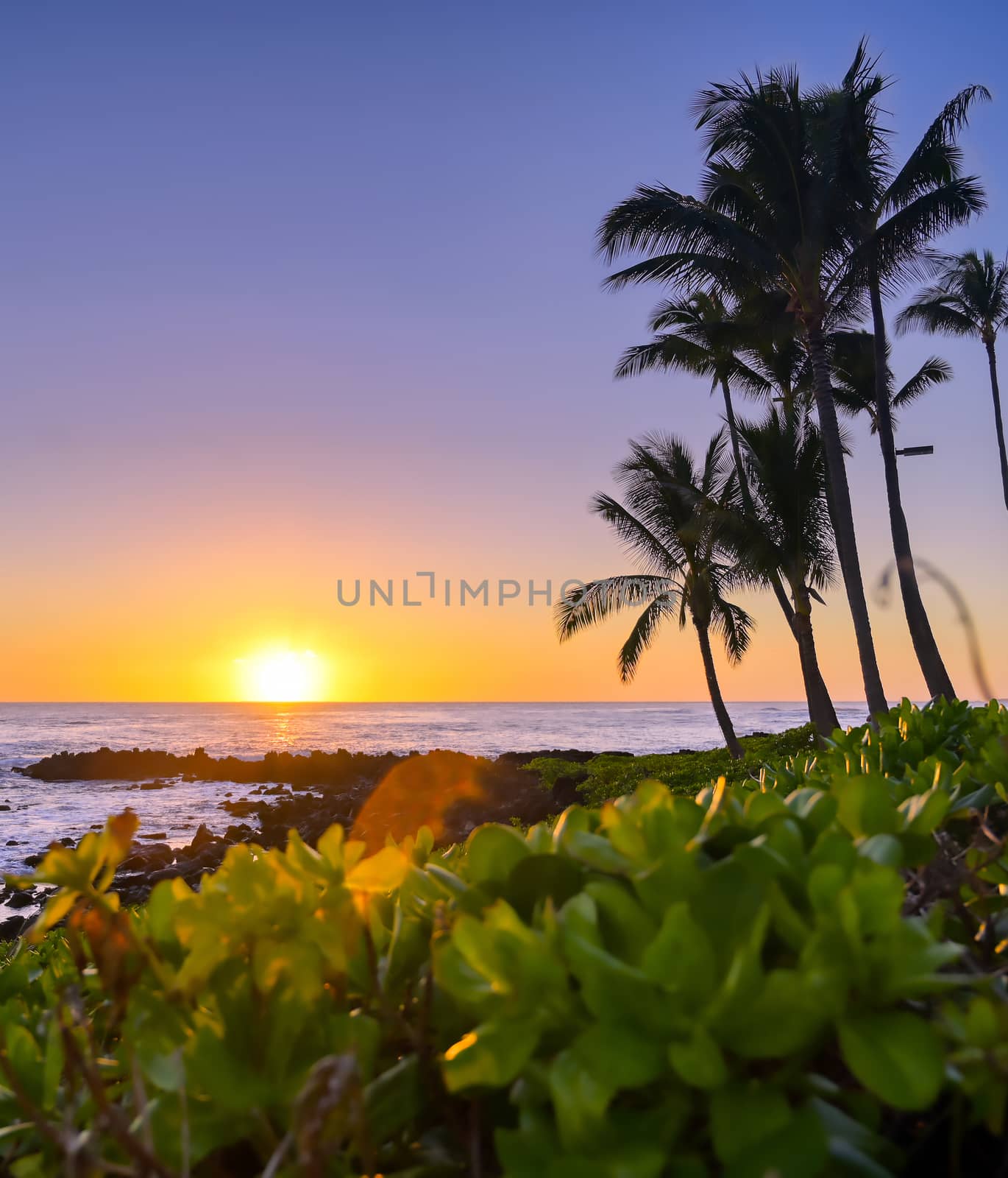 Sunset over the coast of Kauai, Hawaii.