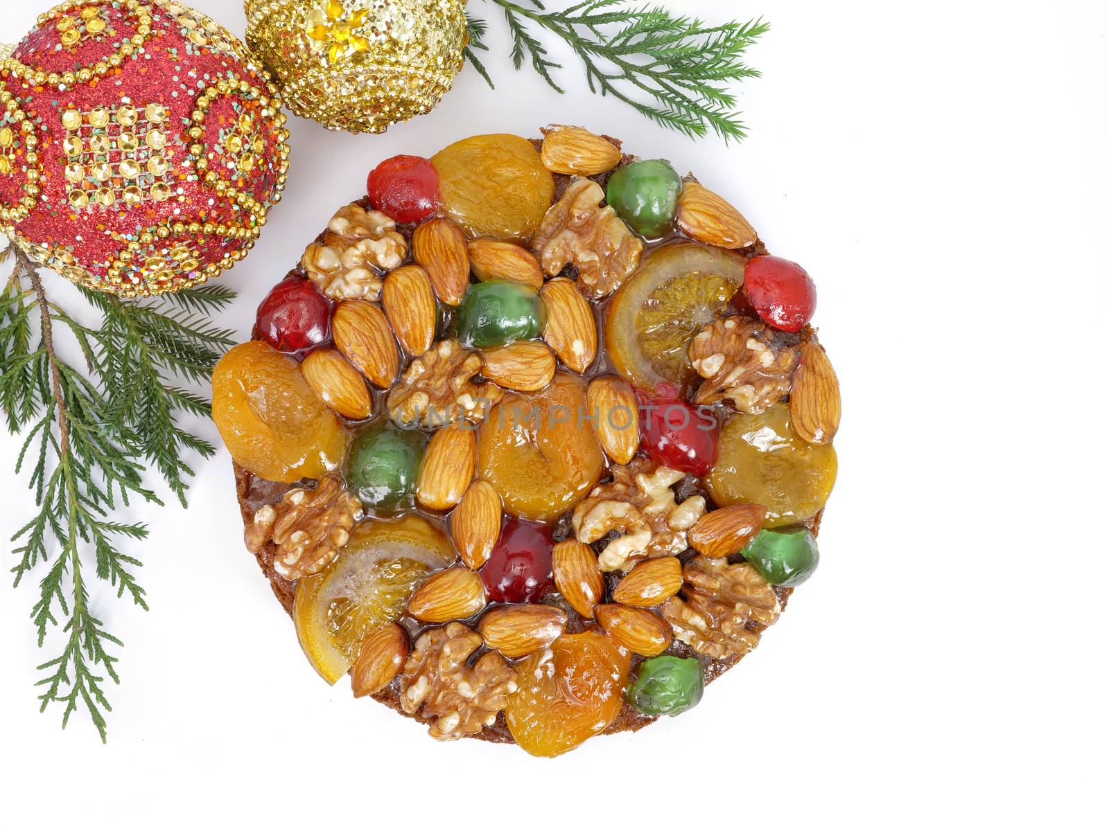 traditional fruitcake with fruits and nuts by Nawoot