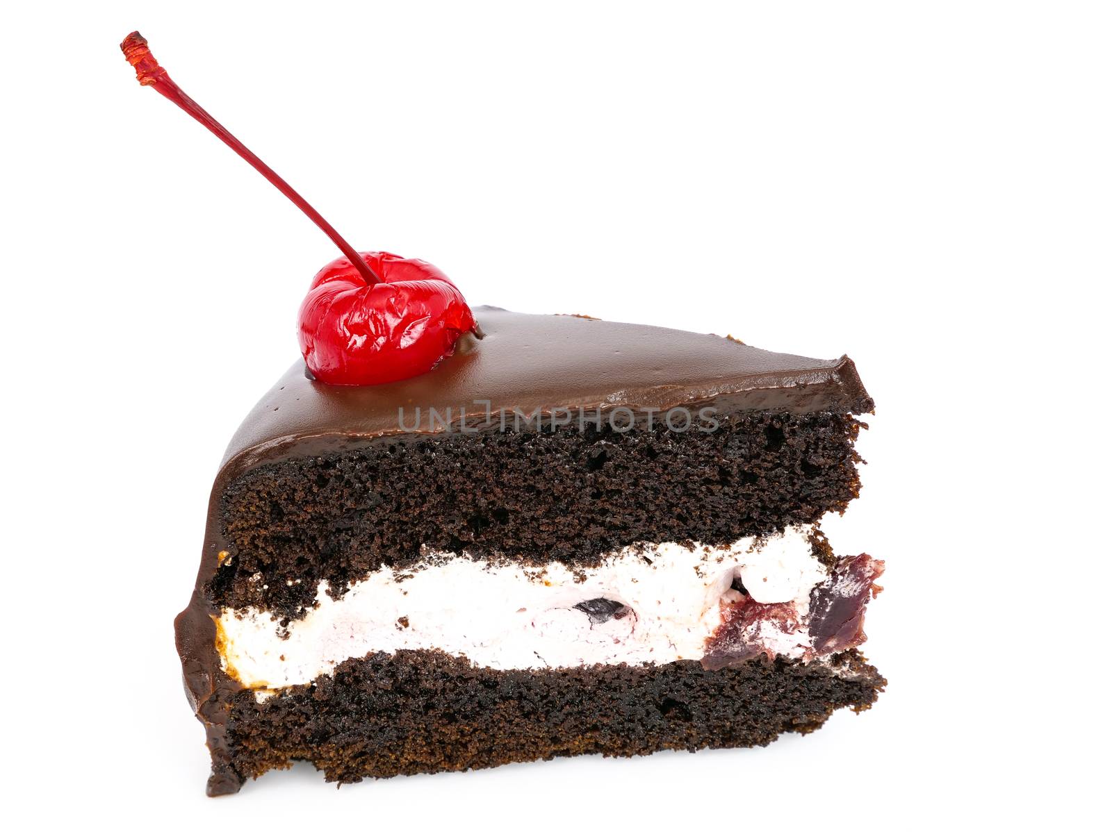 Side view shot of a slice of chocolate cake with cherries and cream filling and chocolate fudge (black forest cake) , isolated on white background