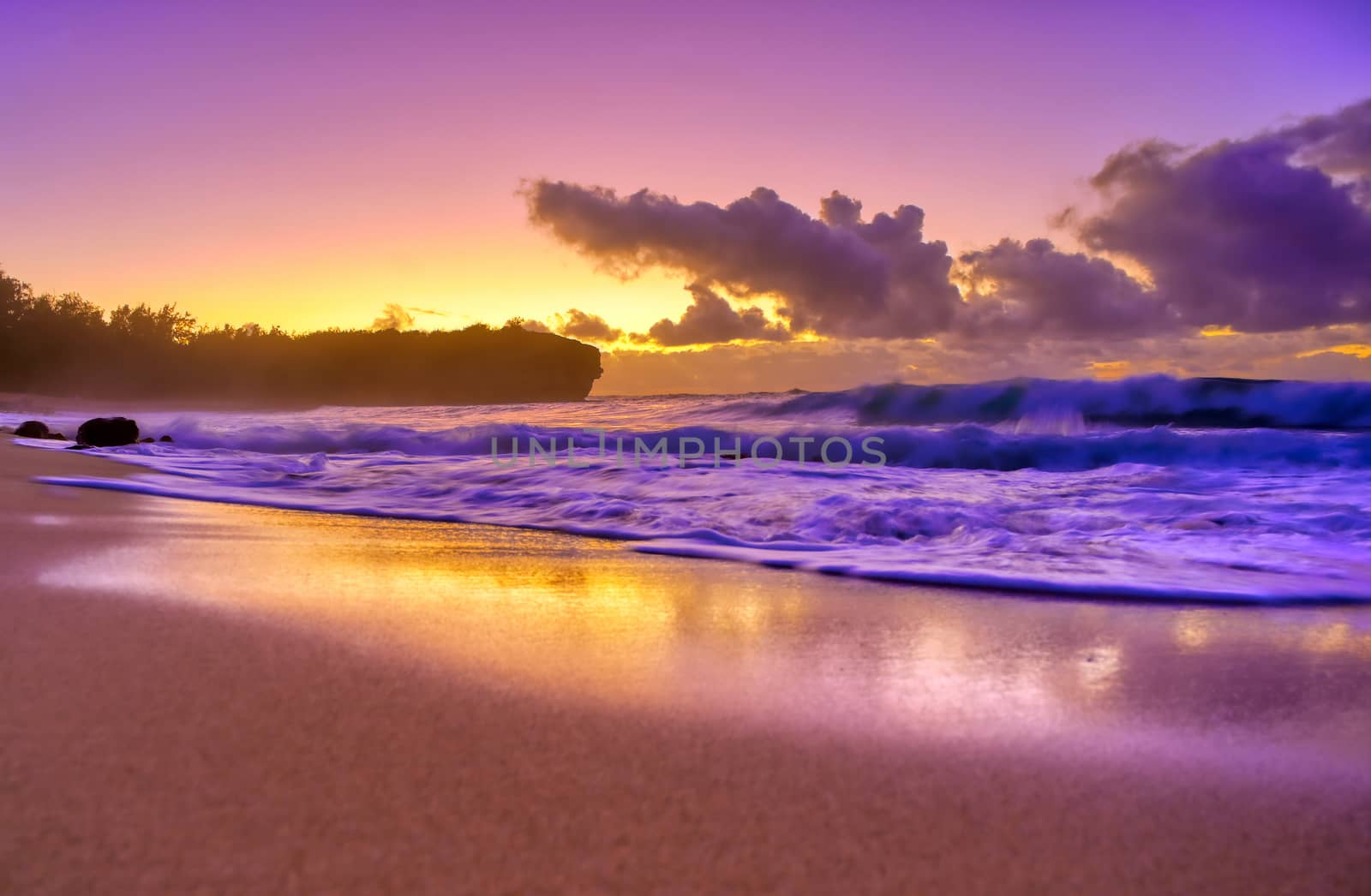 The sunrise over the beach in Kauai, Hawaii