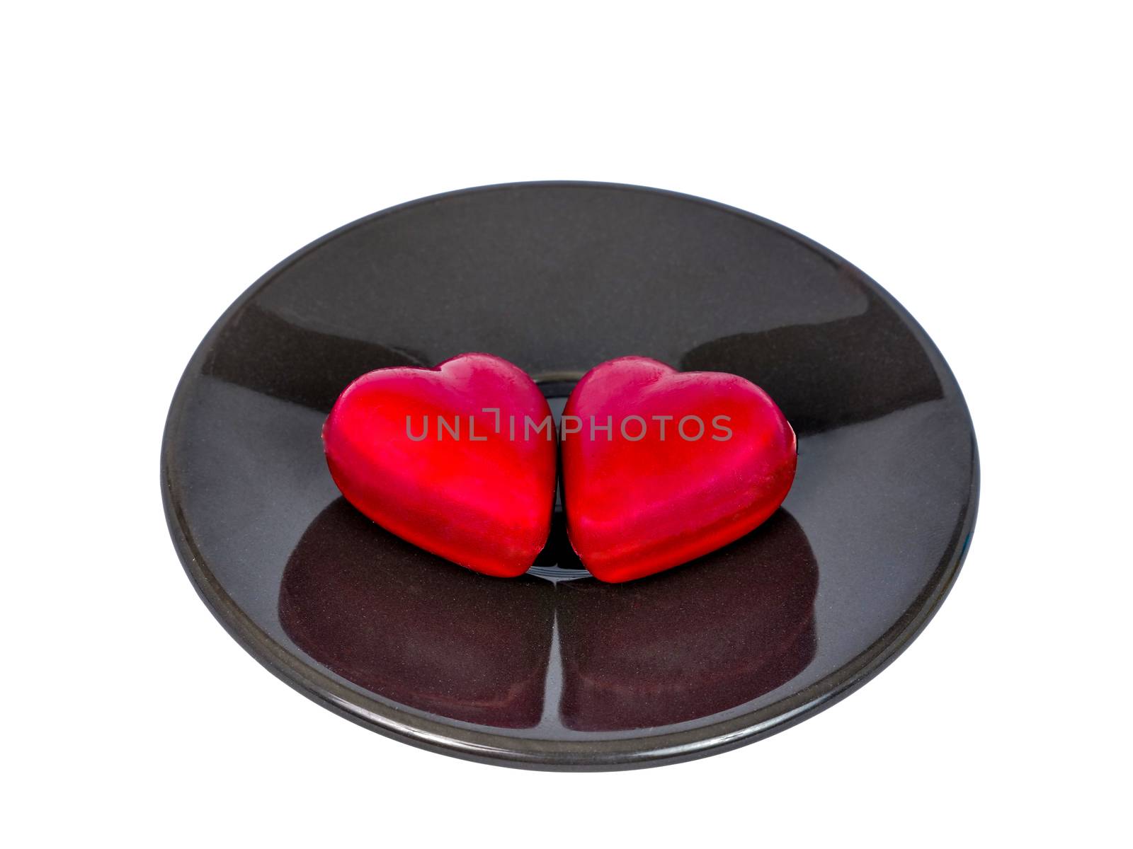 two heart shape chocolate candies by Nawoot