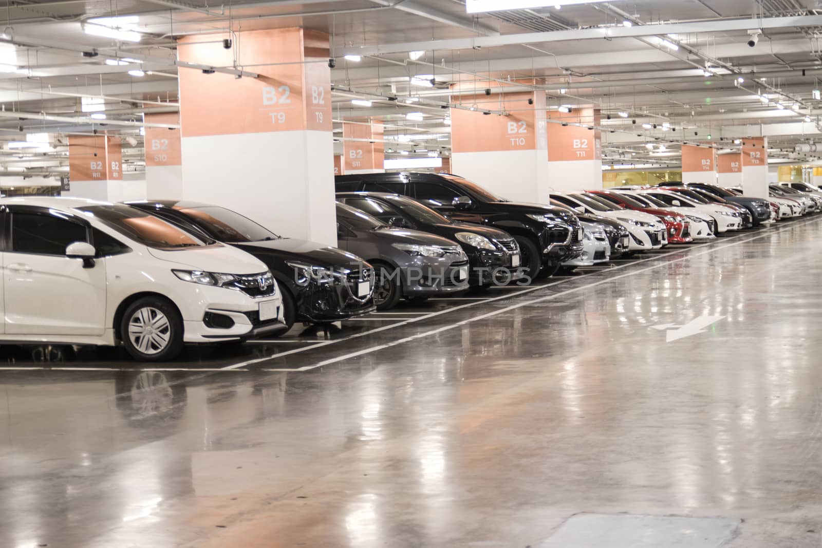 Bangkok Thailand :- june 6, 2020: Parking lot in the building with Orderly park the car along the dividing line