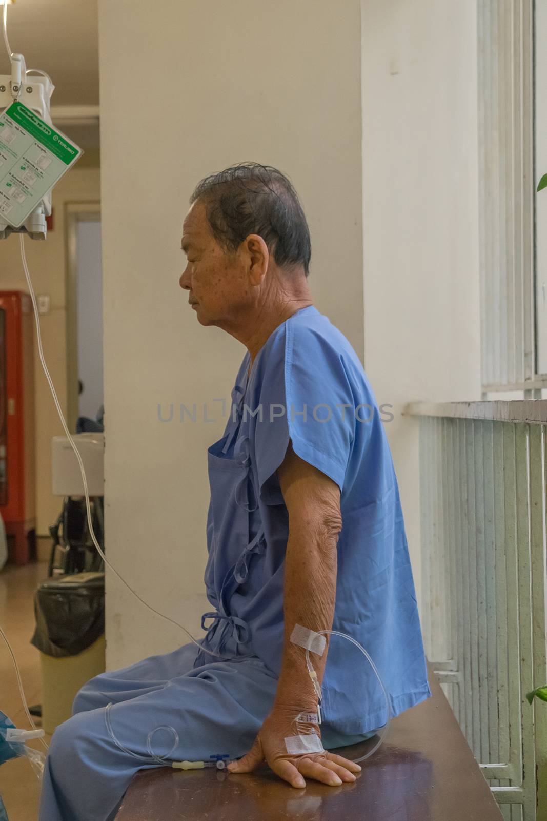 Bangkok, Thailand - July 19, 2015 : Unidentified patient elderly waiting a doctor and nurse in hospital