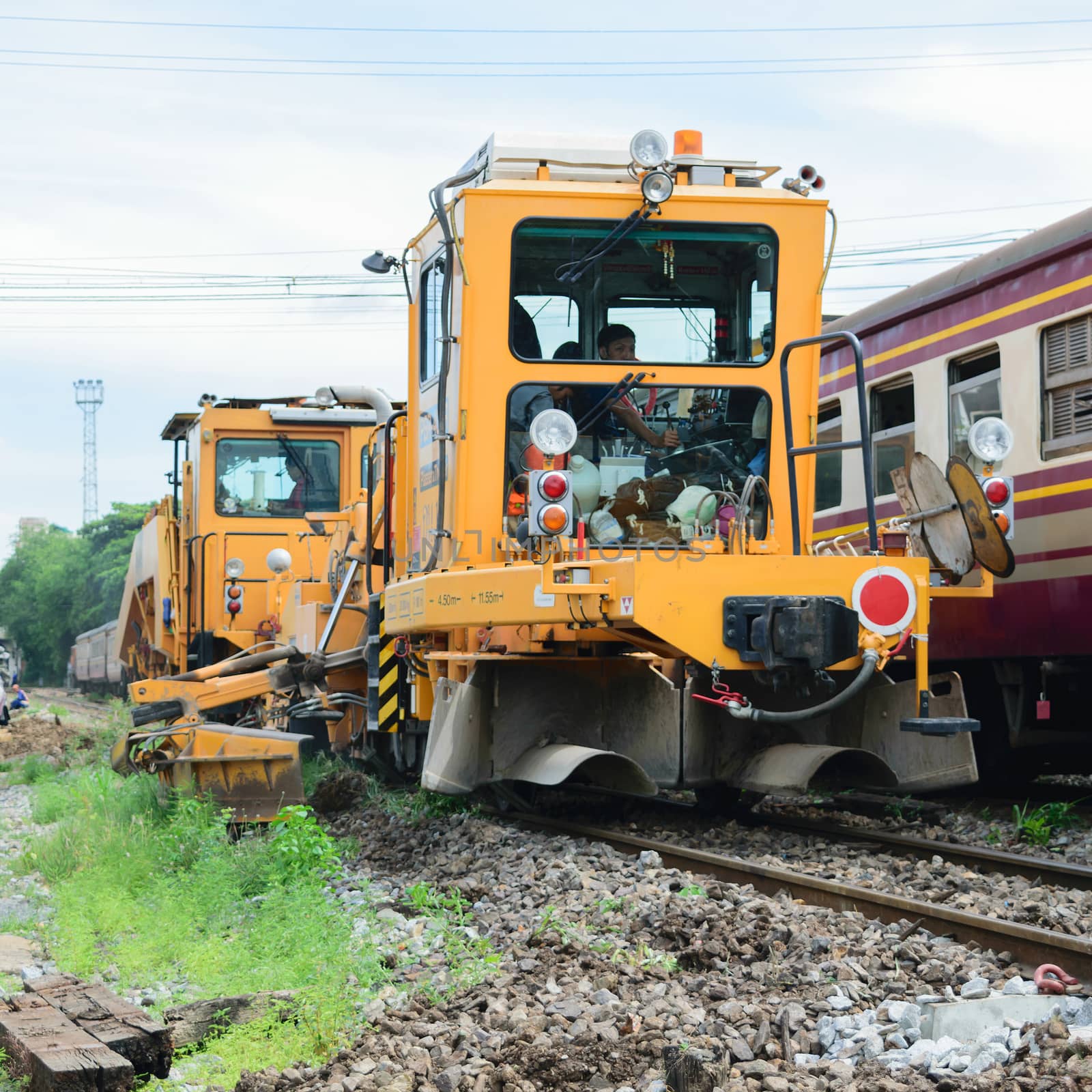 Bangkok, Thailand - September 5, 2015 : Restoration the railroad tracks by Plasser and Theurer machine at State Railway of Thailand.