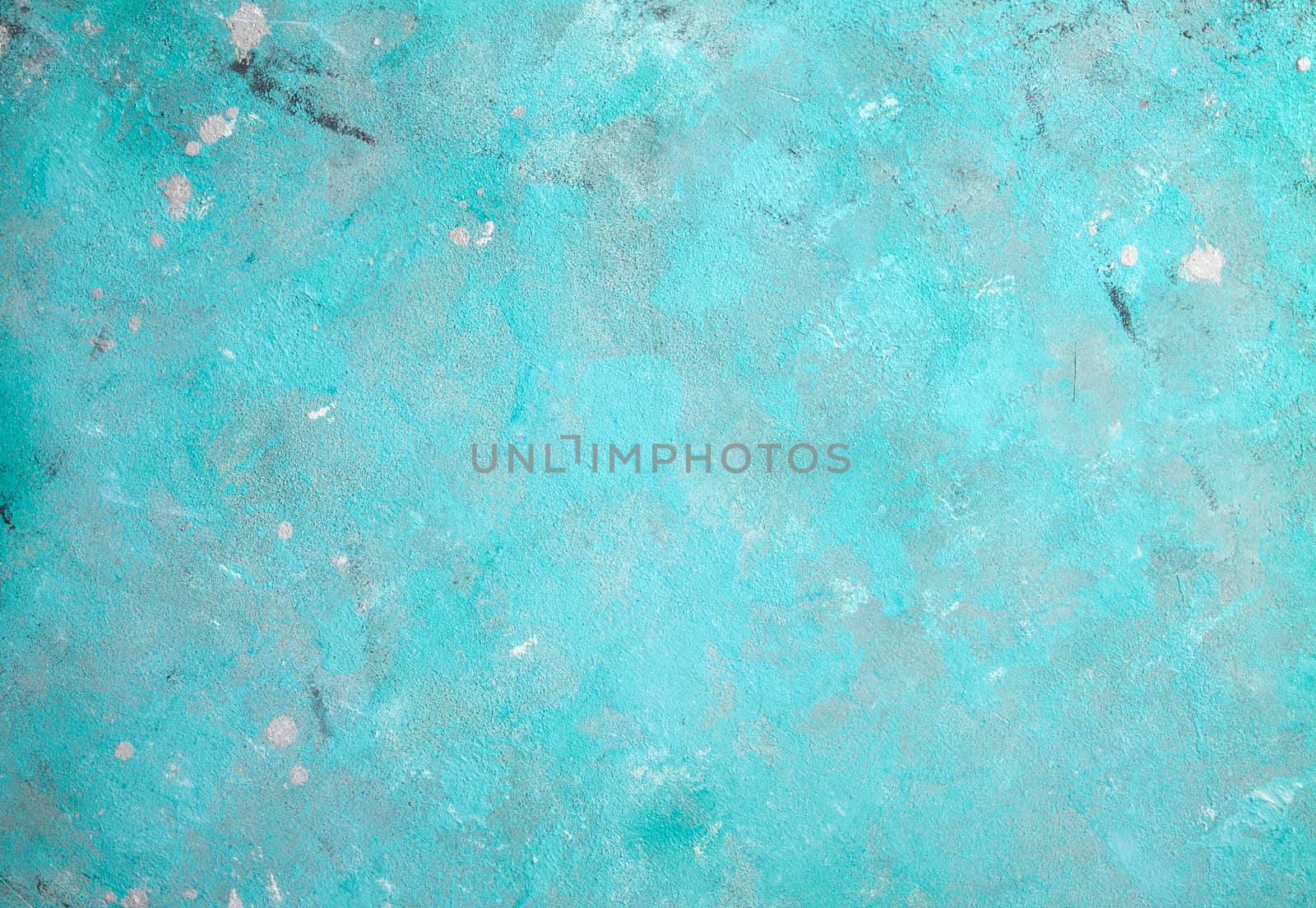 Concrete emerald green background with scuffs and black splashes. Textured wall texture in the grunge style.