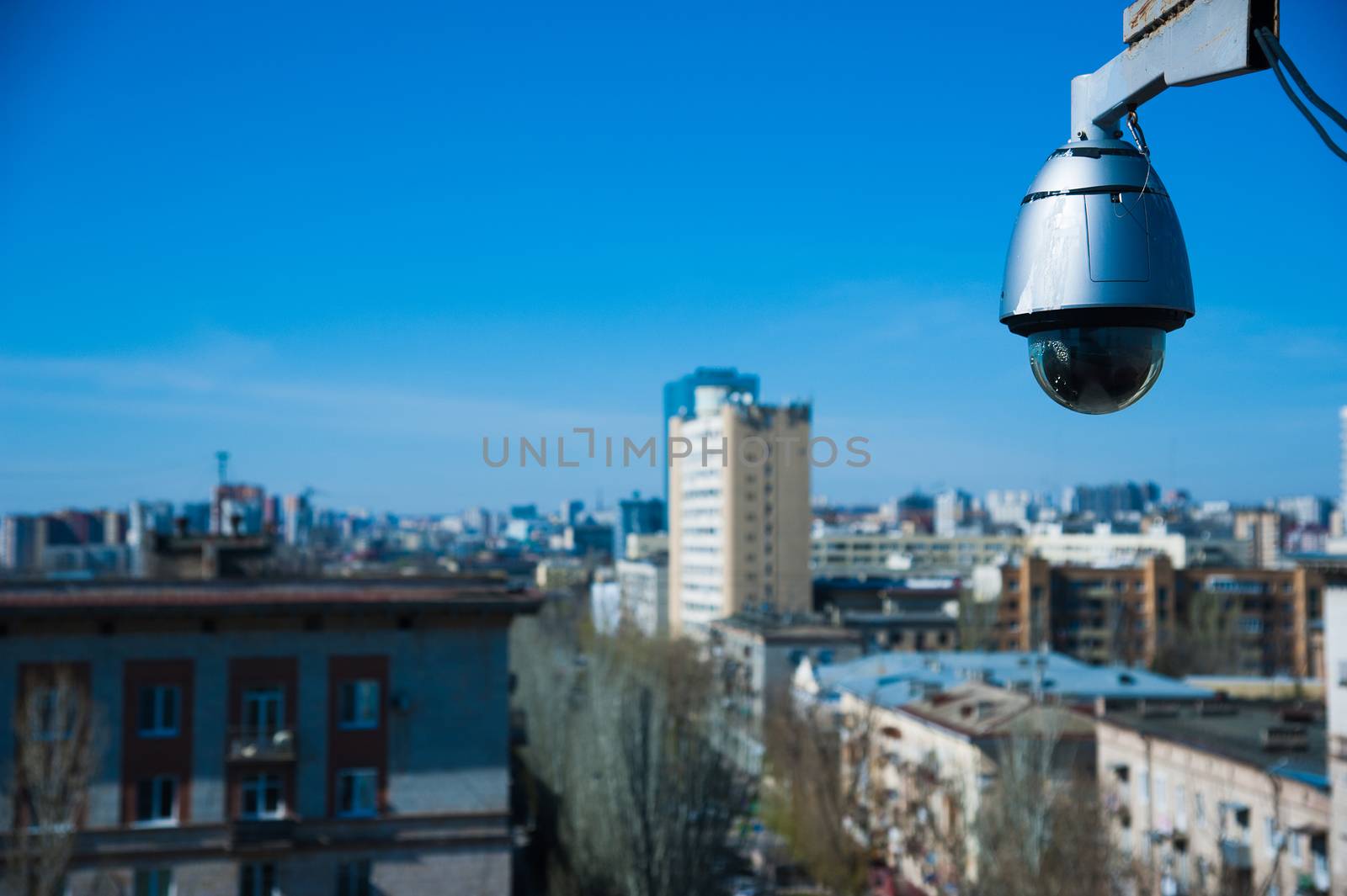 Modern CCTV camera. Concept of surveillance and monitoring by grigorenko