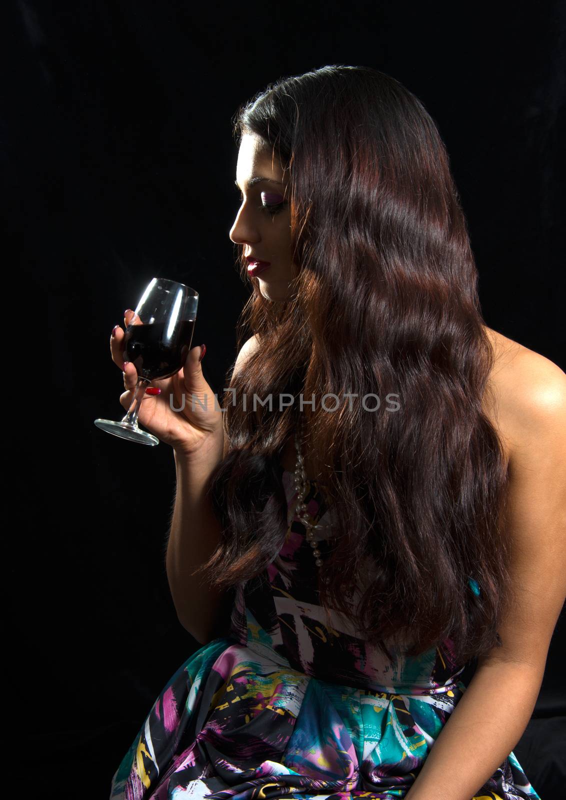 Brunette Woman Drinking Red Wine