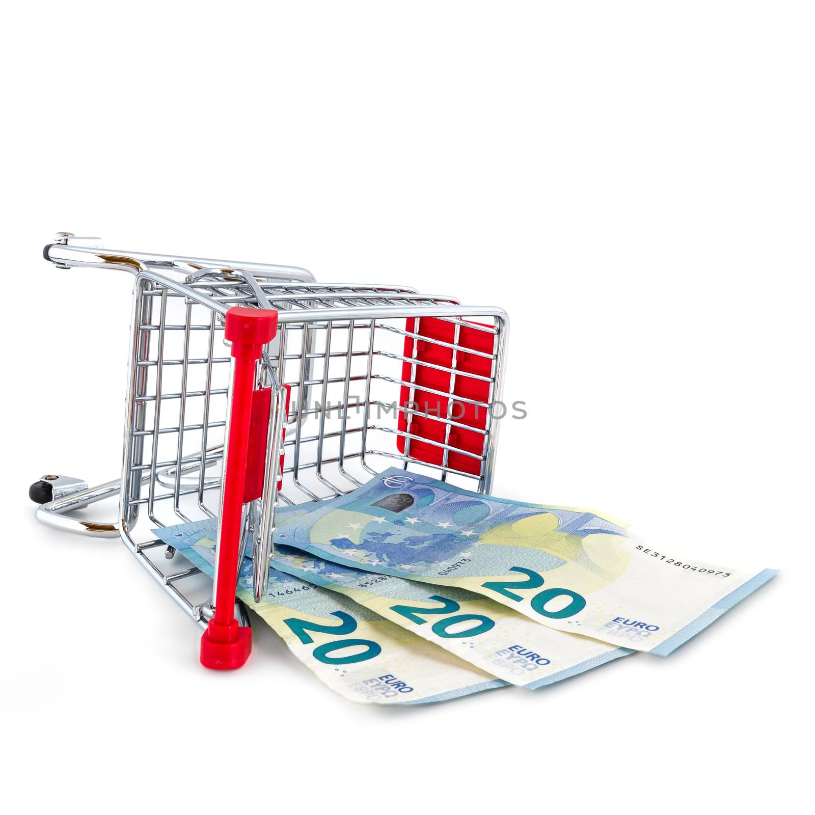 Scattered shopping cart with money by germanopoli