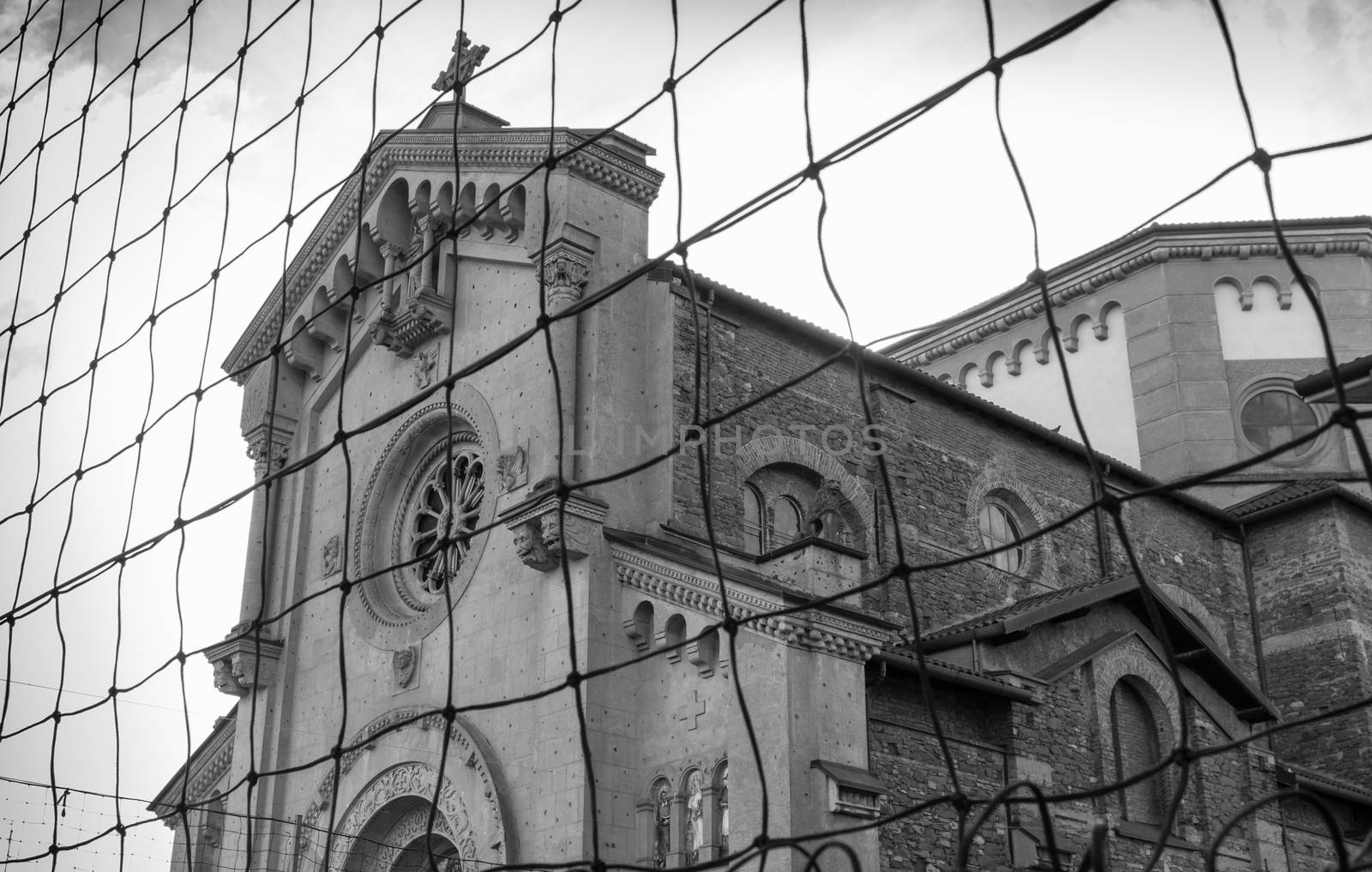 Exterior of a classic Catholic church in Italy.