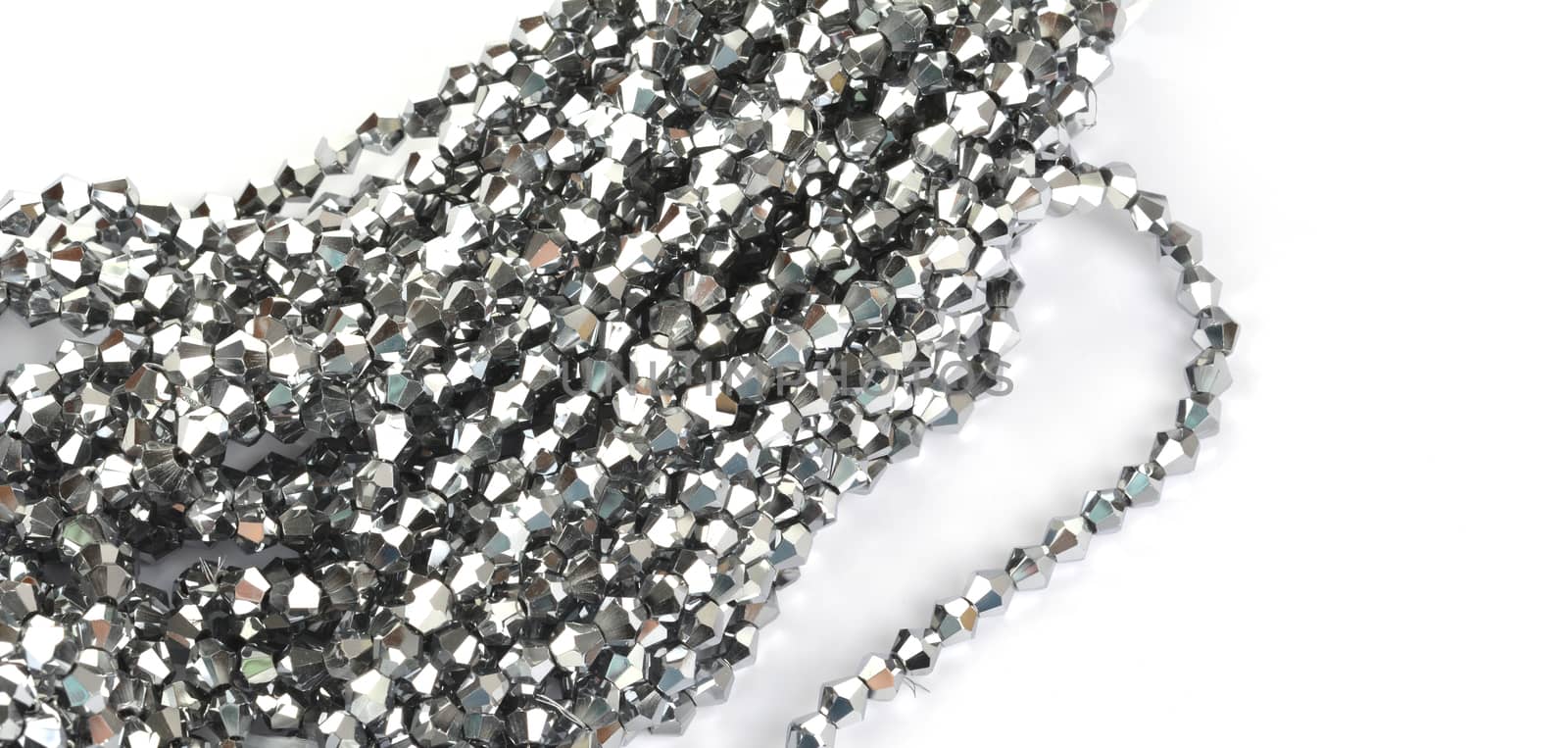 Beautiful color silver gray Glass Sparkle Crystal Isoalted Beads on white background. Use for diy beaded jewelry