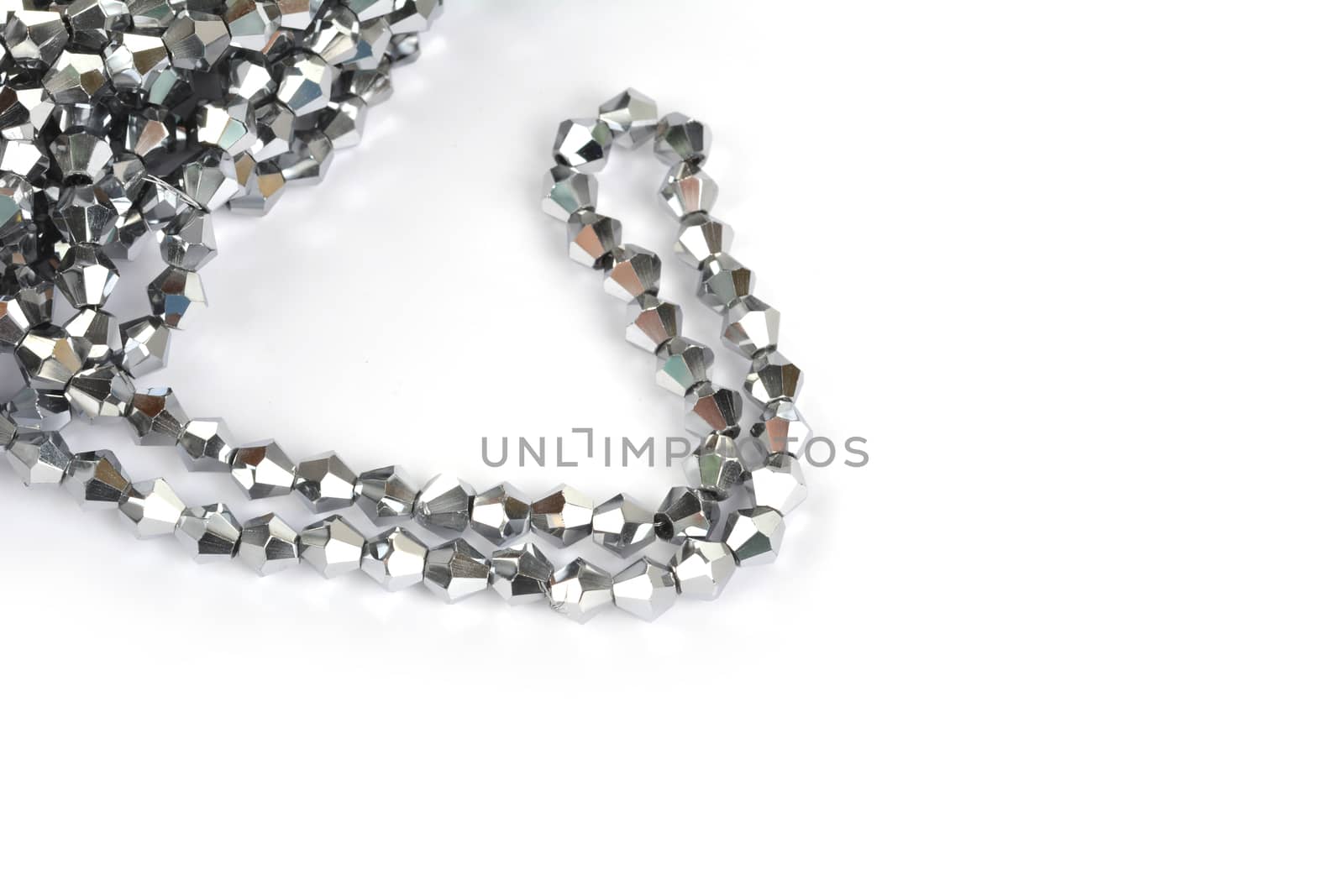 Beautiful color silver gray Glass Sparkle Crystal Isoalted Beads on white background. Use for diy beaded jewelry