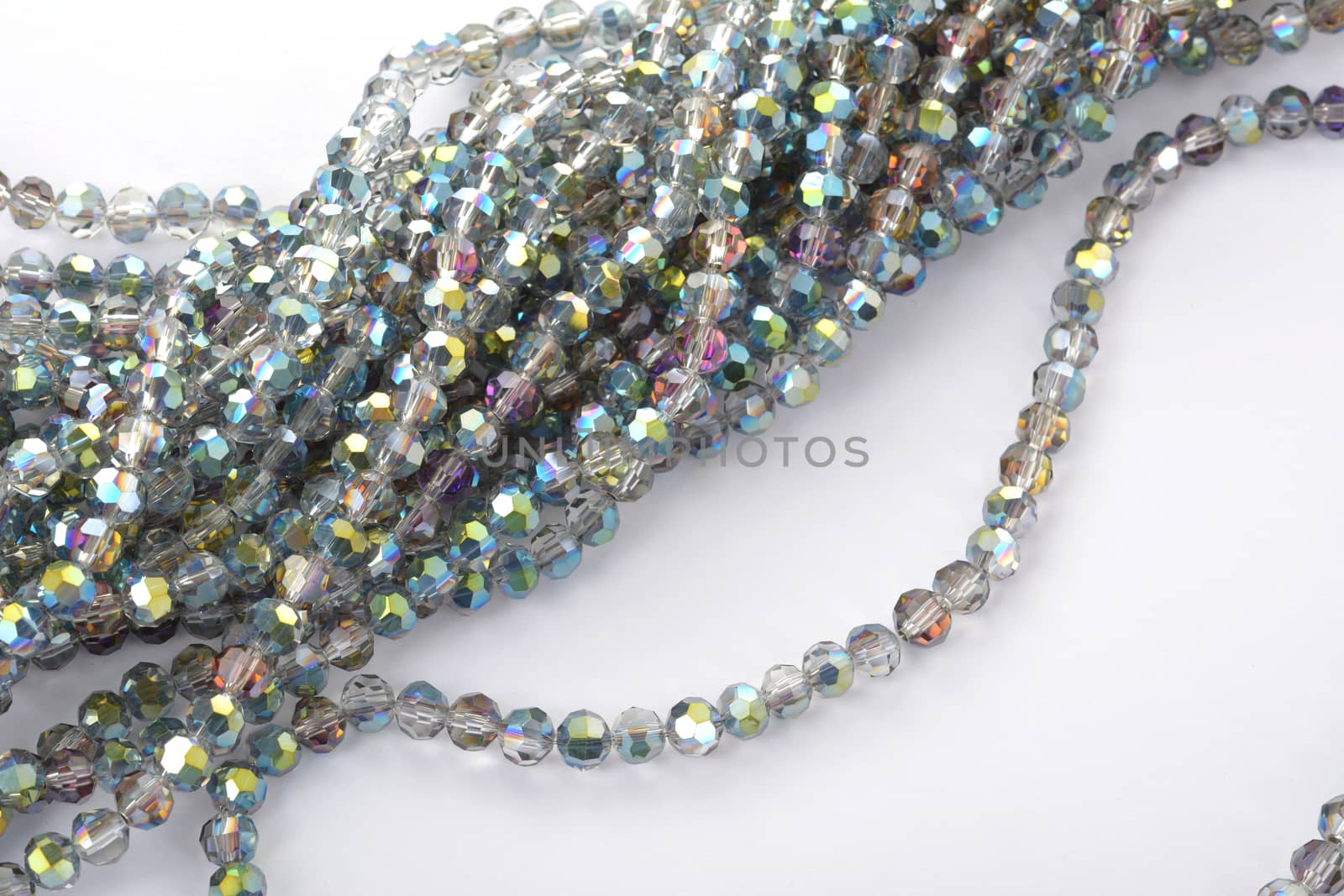 Beautiful color silver gray Glass Sparkle Crystal Isoalted Beads on white background. Use for diy beaded jewelry