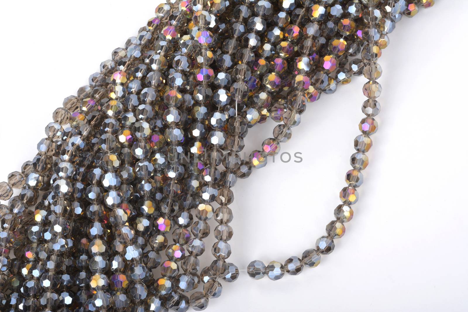 Beautiful color silver gray Glass Sparkle Crystal Isoalted Beads on white background. Use for diy beaded jewelry
