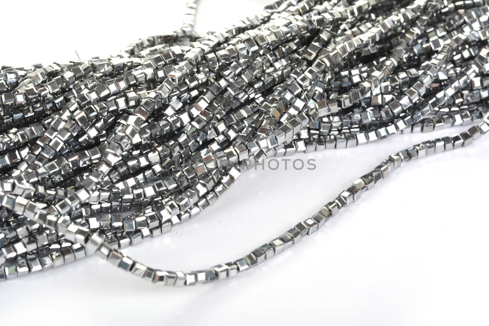 Beautiful color silver gray Glass Sparkle Crystal Isoalted Beads on white background. Use for diy beaded jewelry