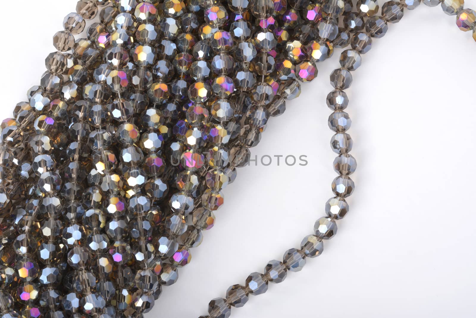 Beautiful color silver gray Glass Sparkle Crystal Isoalted Beads on white background. Use for diy beaded jewelry