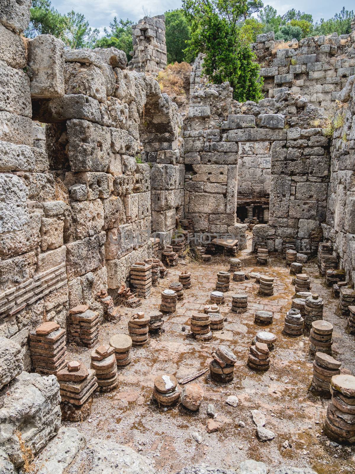 Ruins of large bath in ancient Phaselis city. Famous architectur by aksenovko