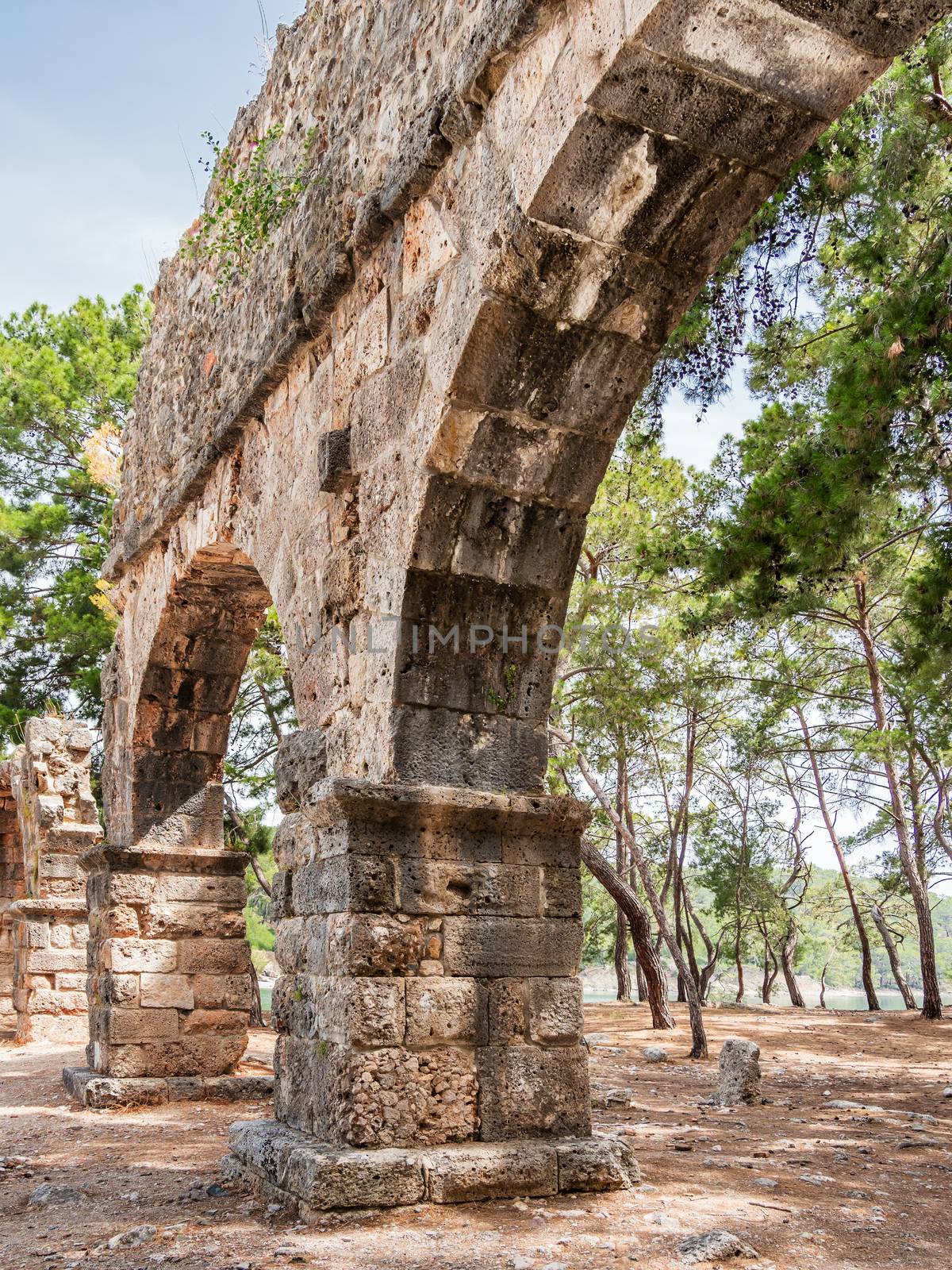 Ruins of large bath in ancient Phaselis city. Famous architectural landmark, Kemer district, Antalya province. Turkey.