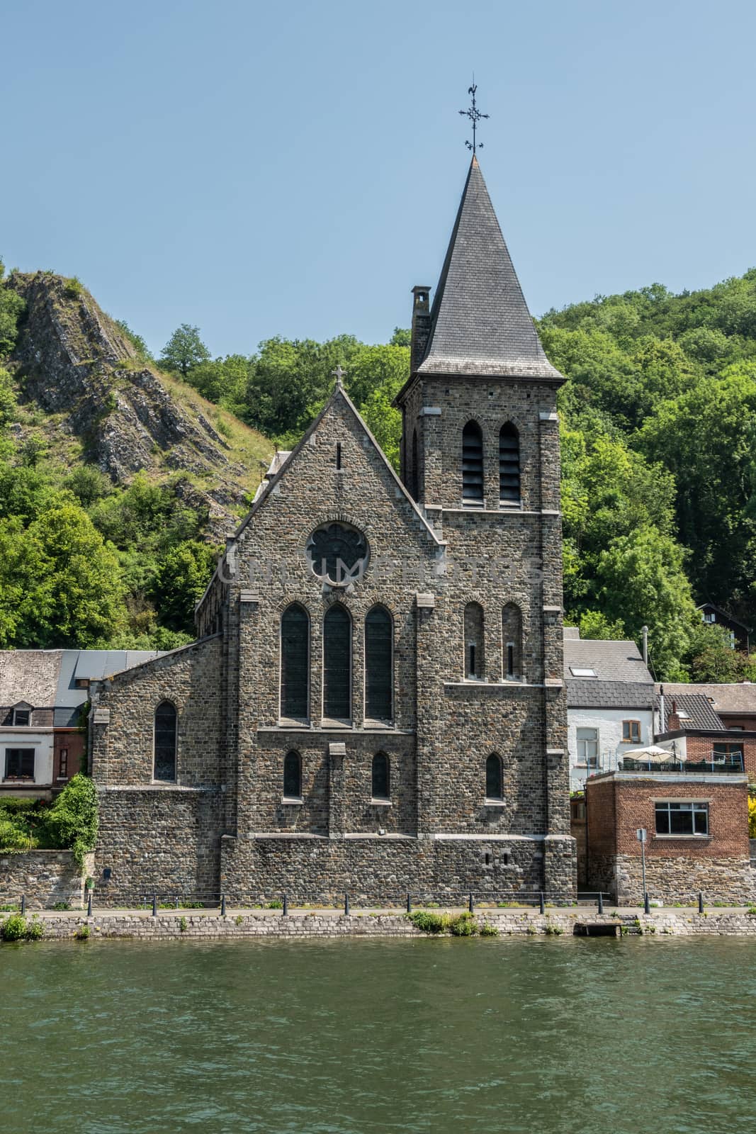 Saint Paul church along Meuse River in Dinant, Belgium. by Claudine