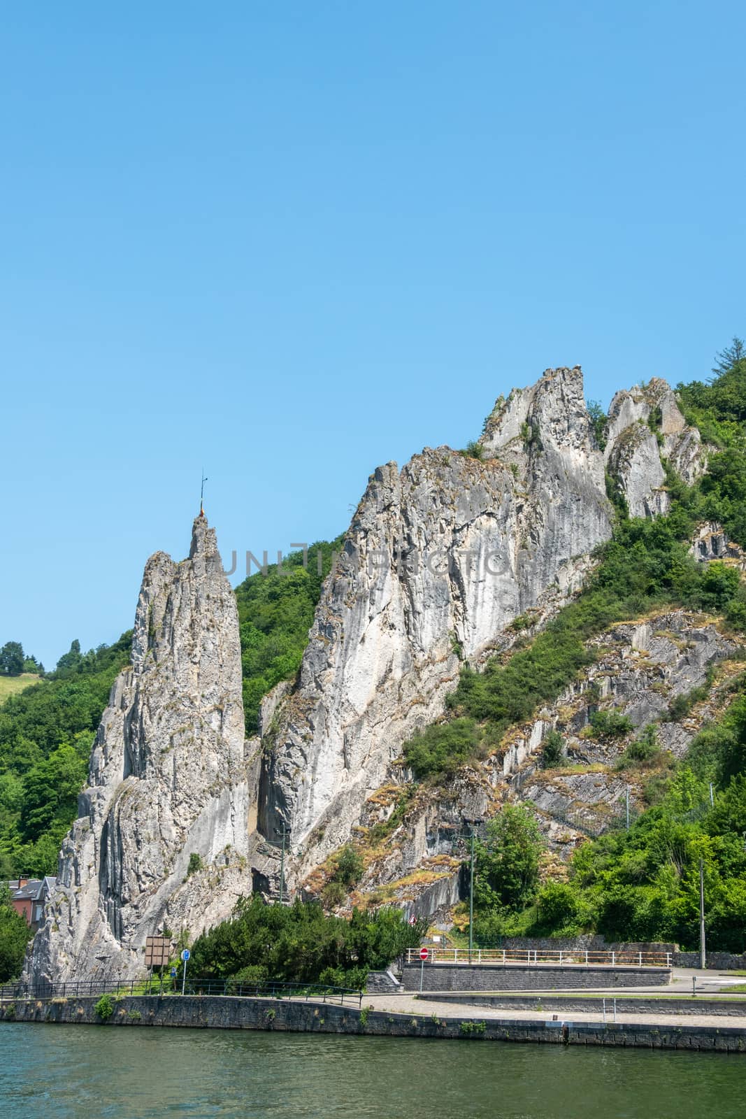 South side of Le rocher Bayard along Meuse River in Dinant, Belg by Claudine