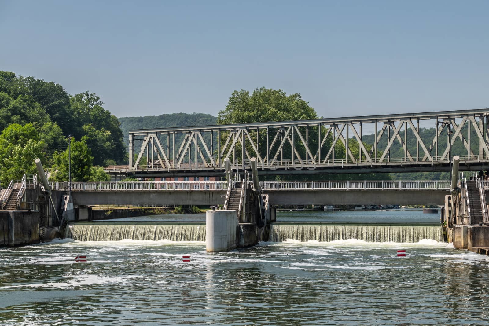 Closeup of Rapid and train bridge over Meuse River, Dinant Belgi by Claudine