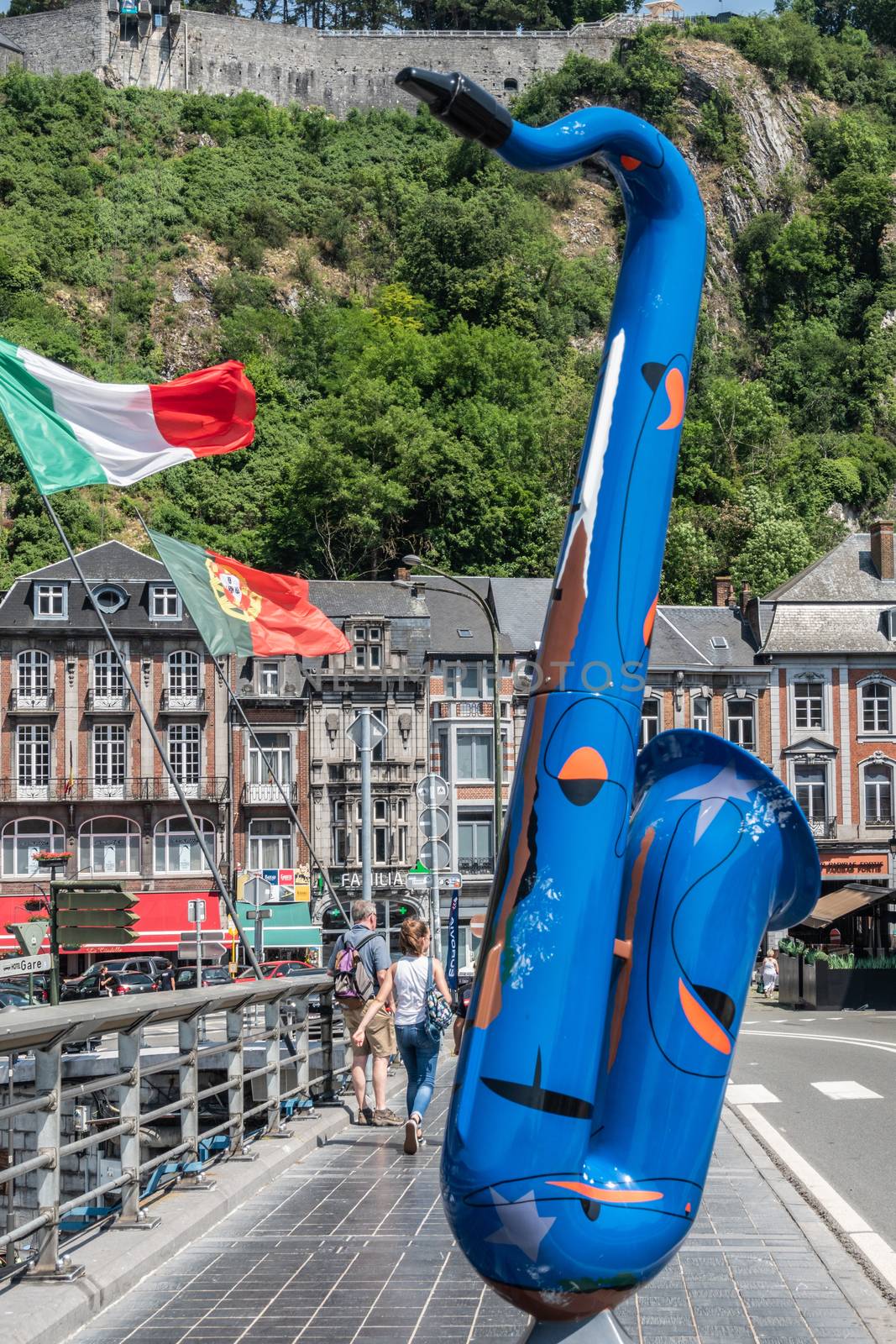 Blue Saxophone statue in Dinant, Belgium. by Claudine