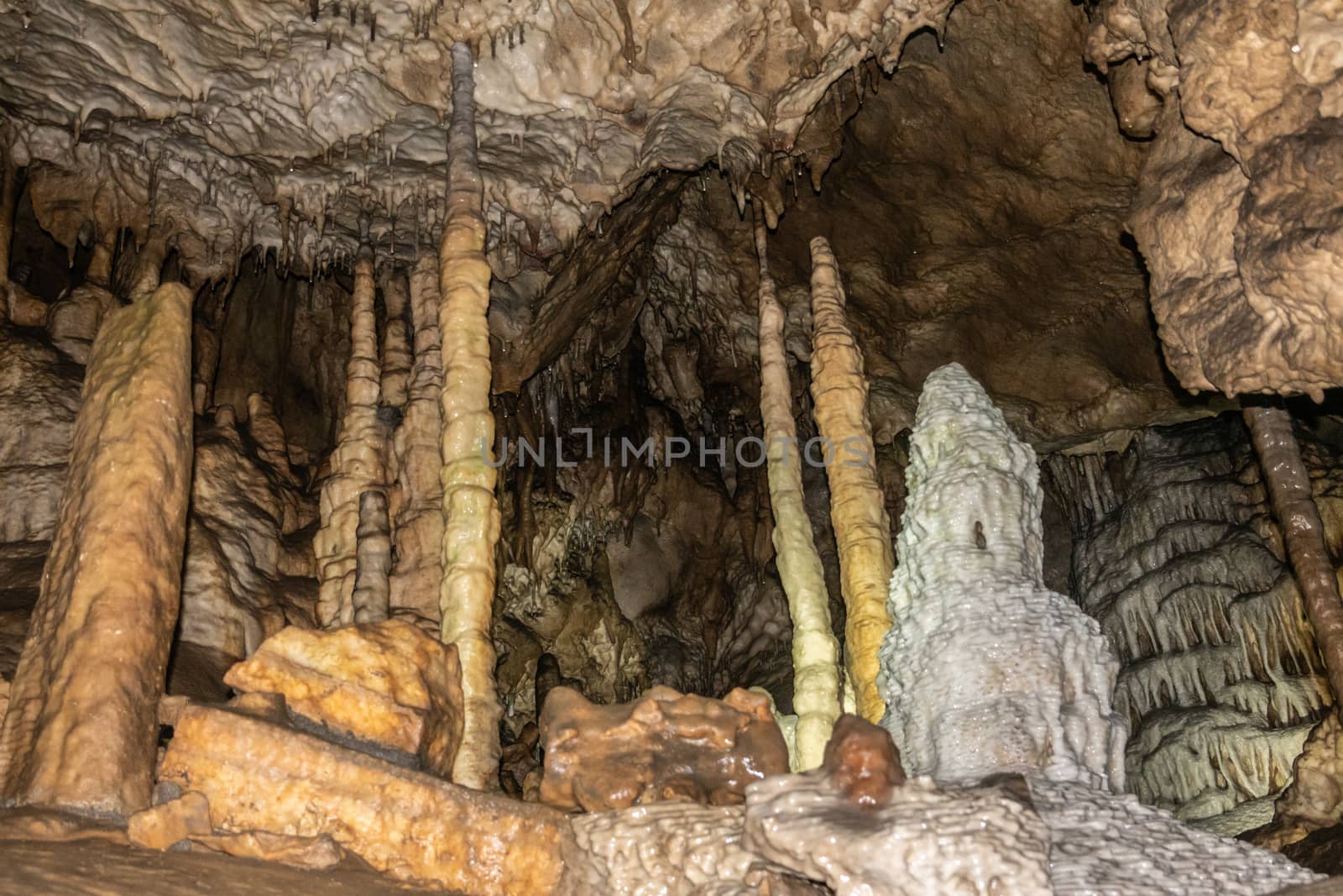 Han-sur-Lesse, Belgium - June 25, 2019: Grottes-de-Han 8 of 36. subterranean pictures of Stalagmites and stalactites in different shapes and colors throughout tunnels, caverns and large halls..